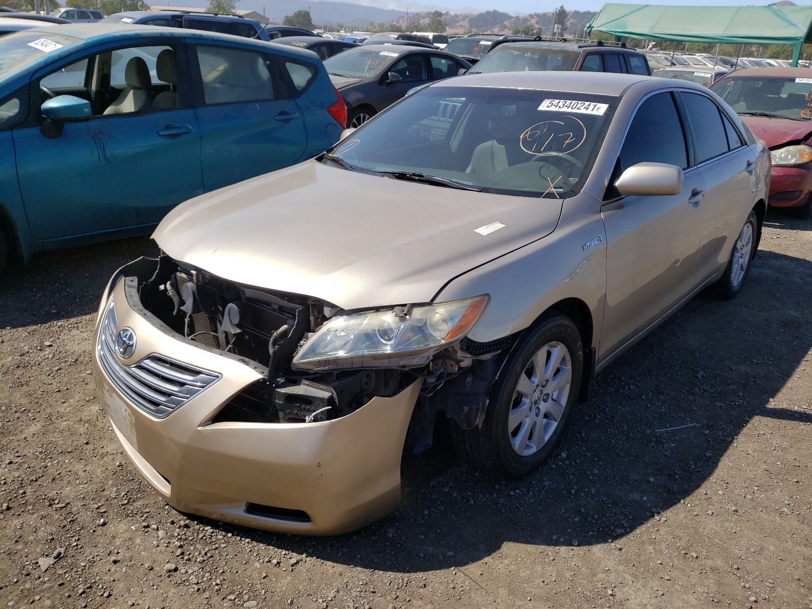 Photo 2 from auction – 2007 TOYOTA CAMRY HYBR with VIN JTNBB46K173030261