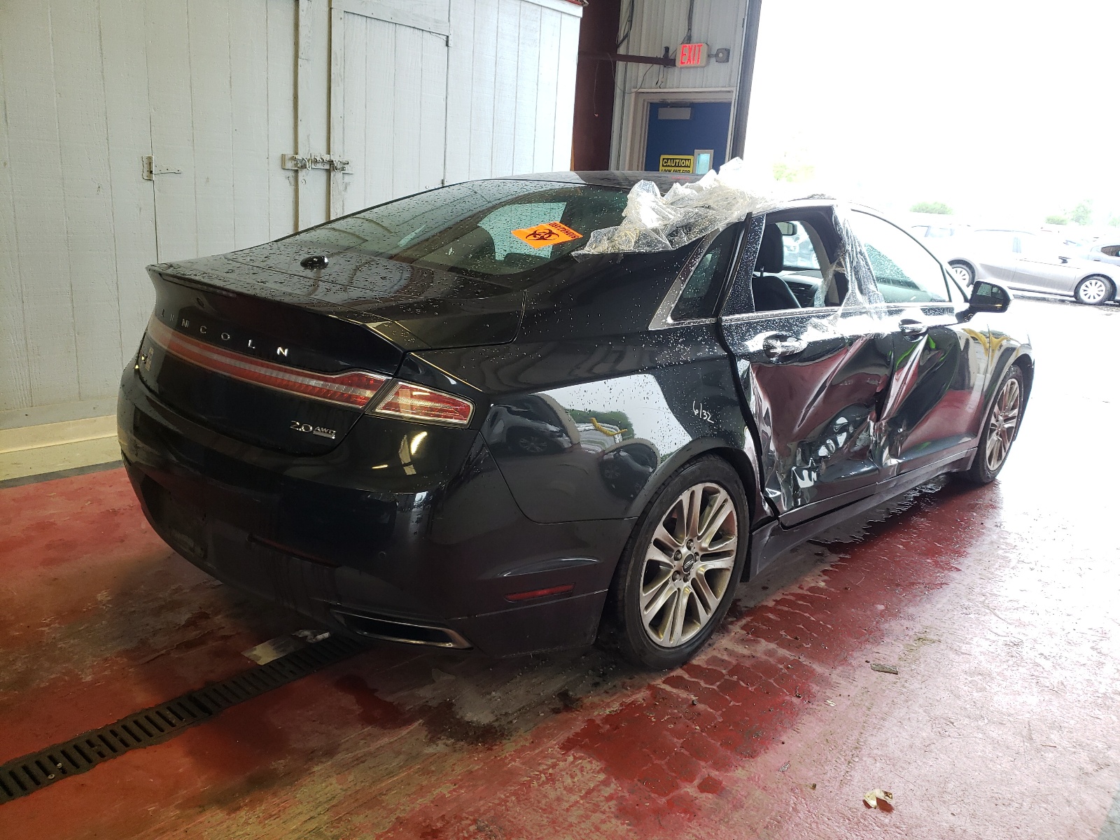 Photo 4 from auction – 2014 LINCOLN MKZ with VIN 3LN6L2J94ER815122