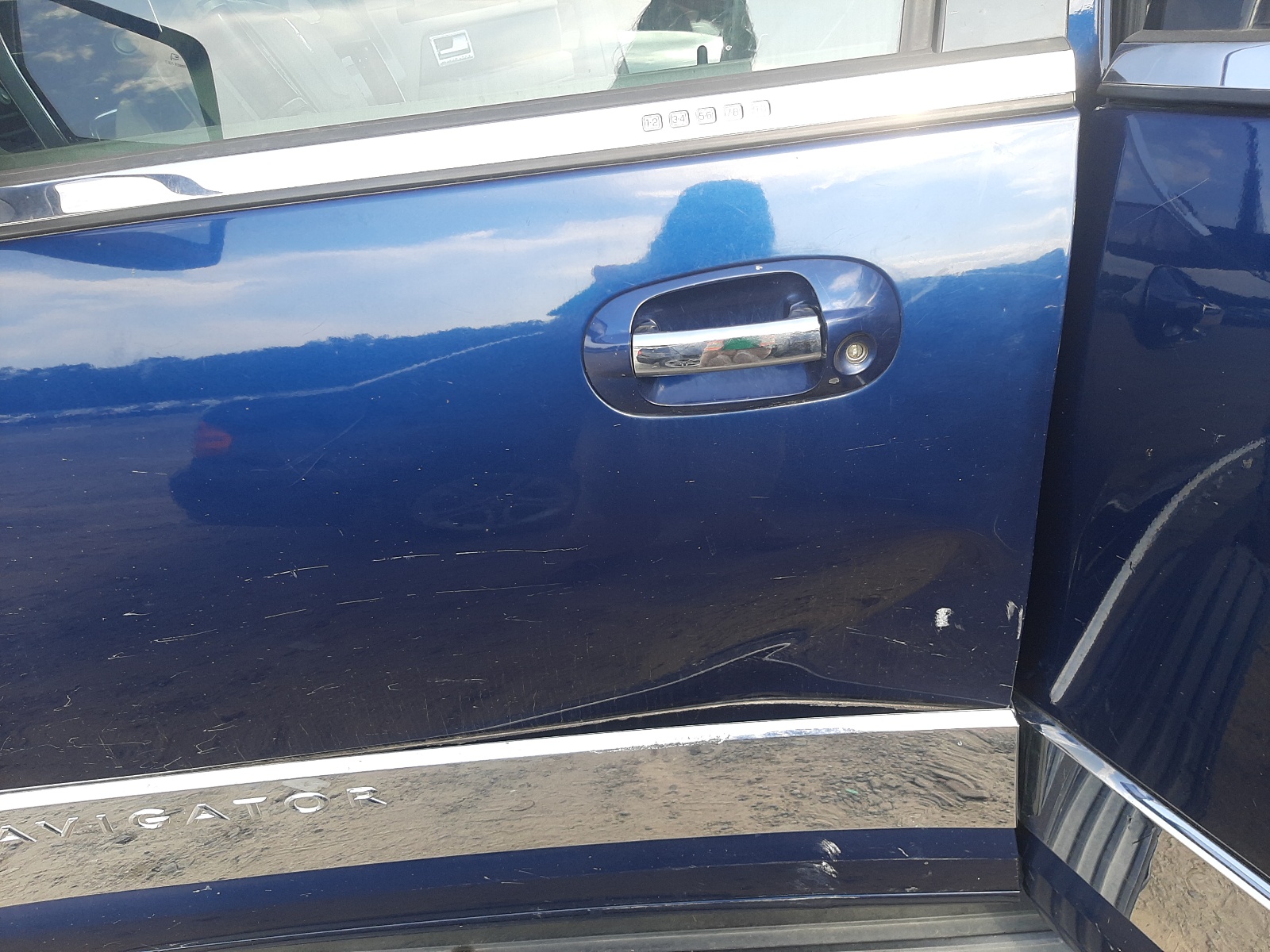 Photo 10 from auction – 2007 LINCOLN NAVIGATOR with VIN 5LMFU27517LJ12044