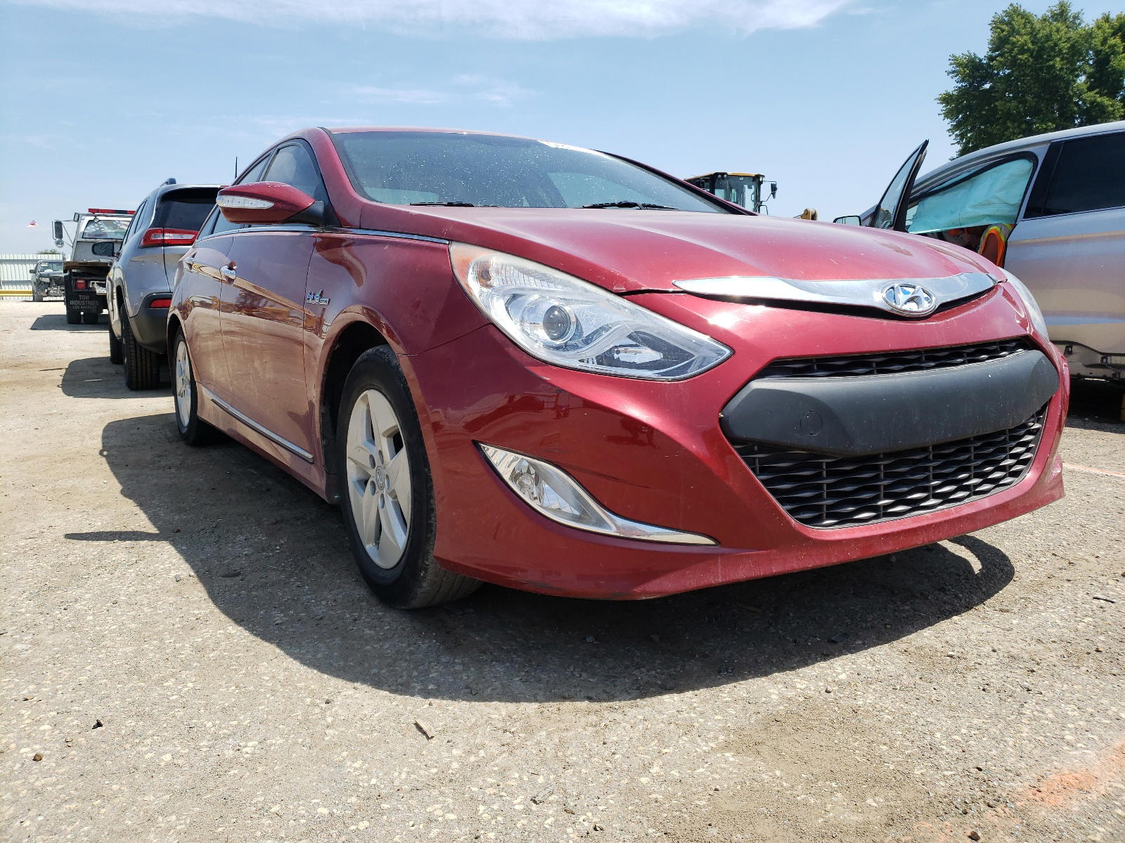 HYUNDAI SONATA HYB 2012 with VIN KMHEC4A45CA034953 - Photo from auction
