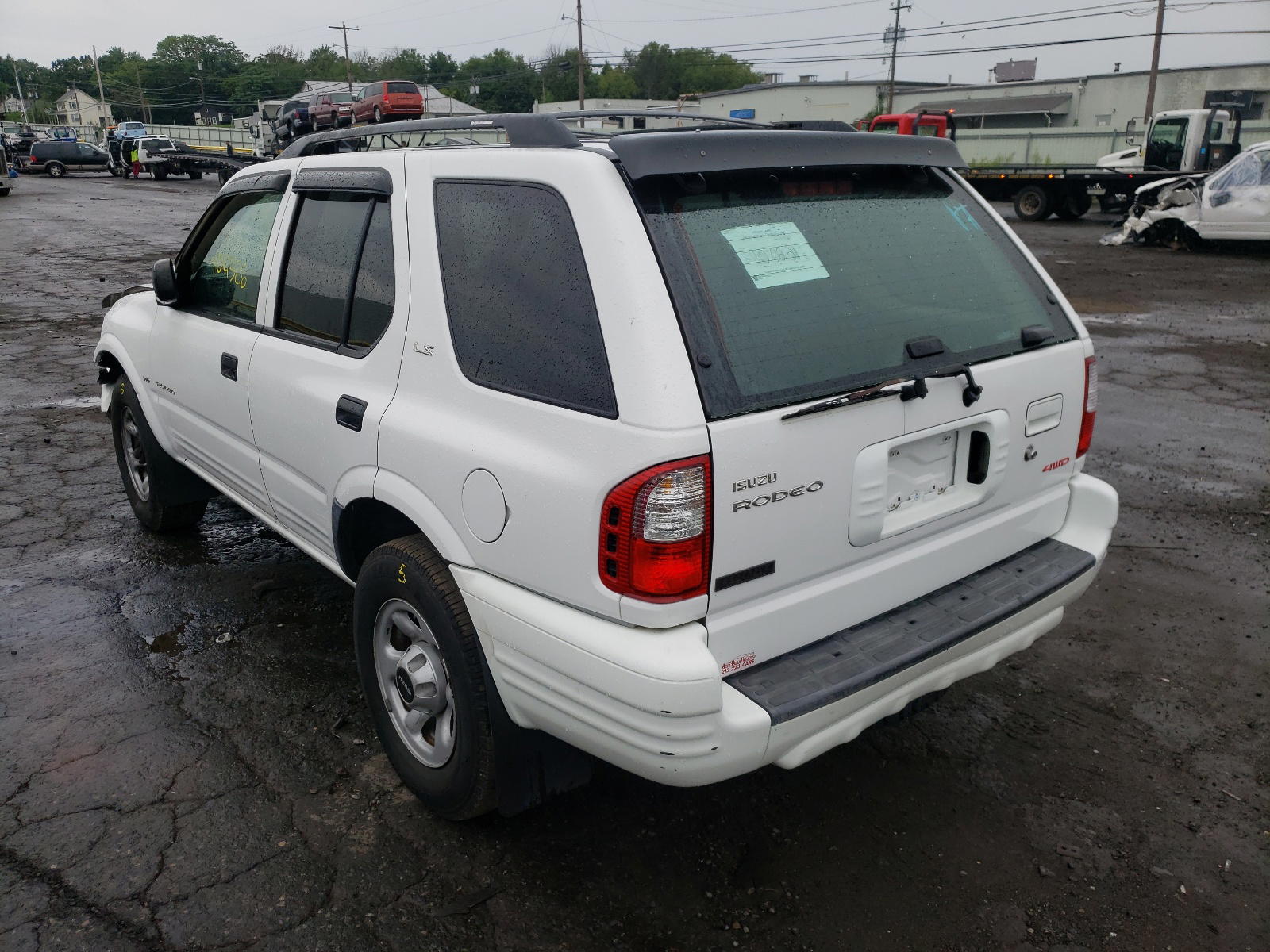 Photo 3 from auction – 2001 ISUZU RODEO S with VIN 4S2DM58W314353553