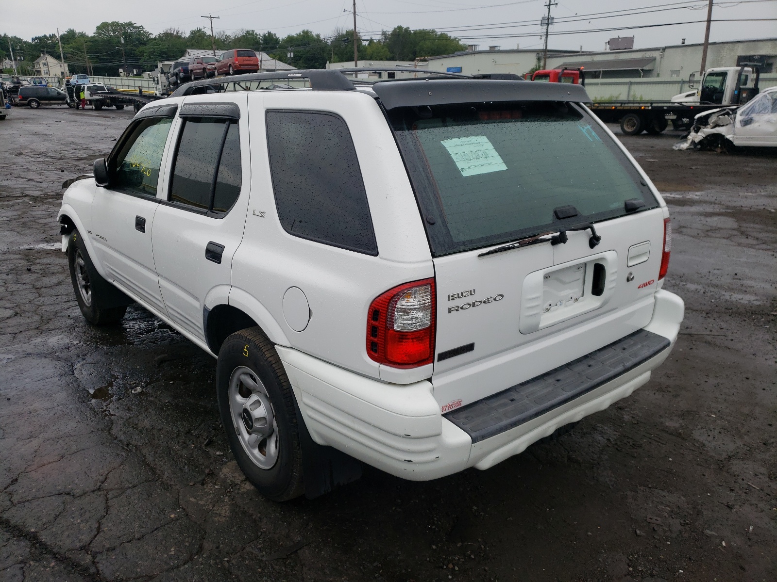 Zdjęcie 3 z aukcji – 2001 ISUZU RODEO S z VIN 4S2DM58W314353553