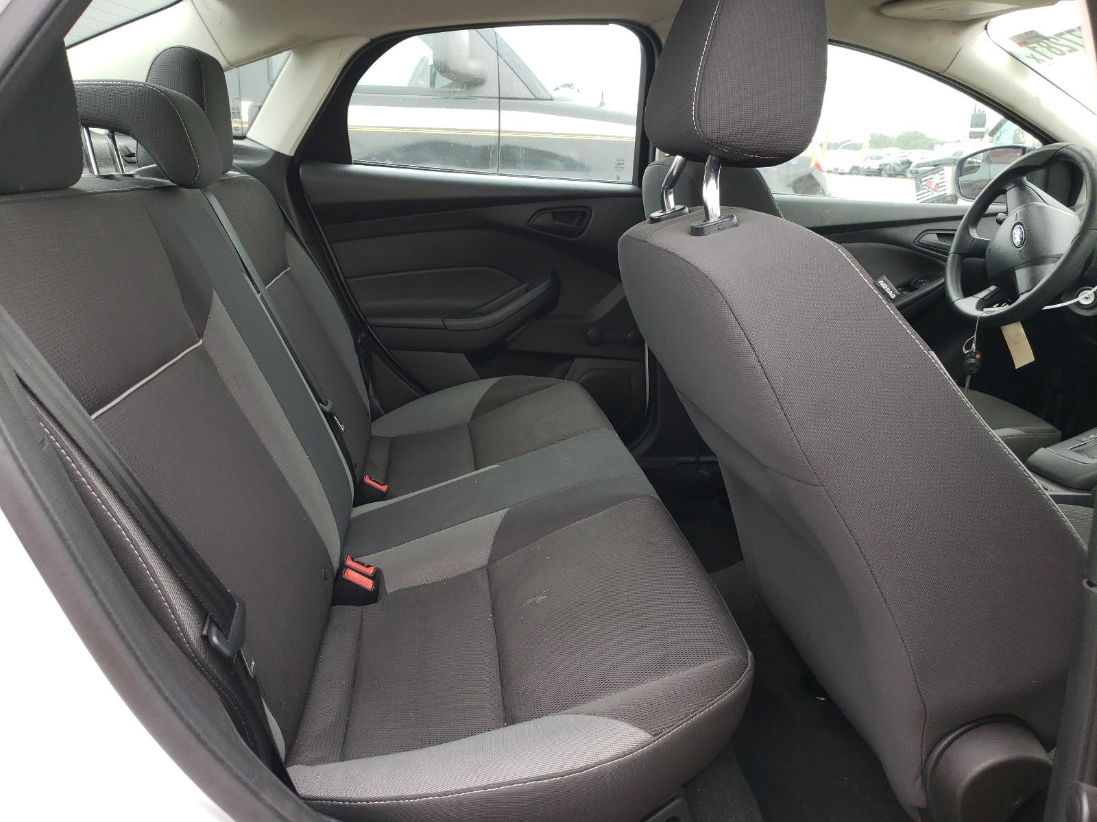 Photo 6 from auction – 2013 FORD FOCUS S with VIN 1FADP3E2XDL156341