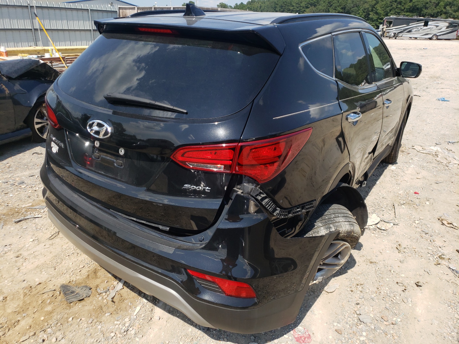 Photo 4 from auction – 2017 HYUNDAI SANTA FE S with VIN 5NMZU3LB4HH029779