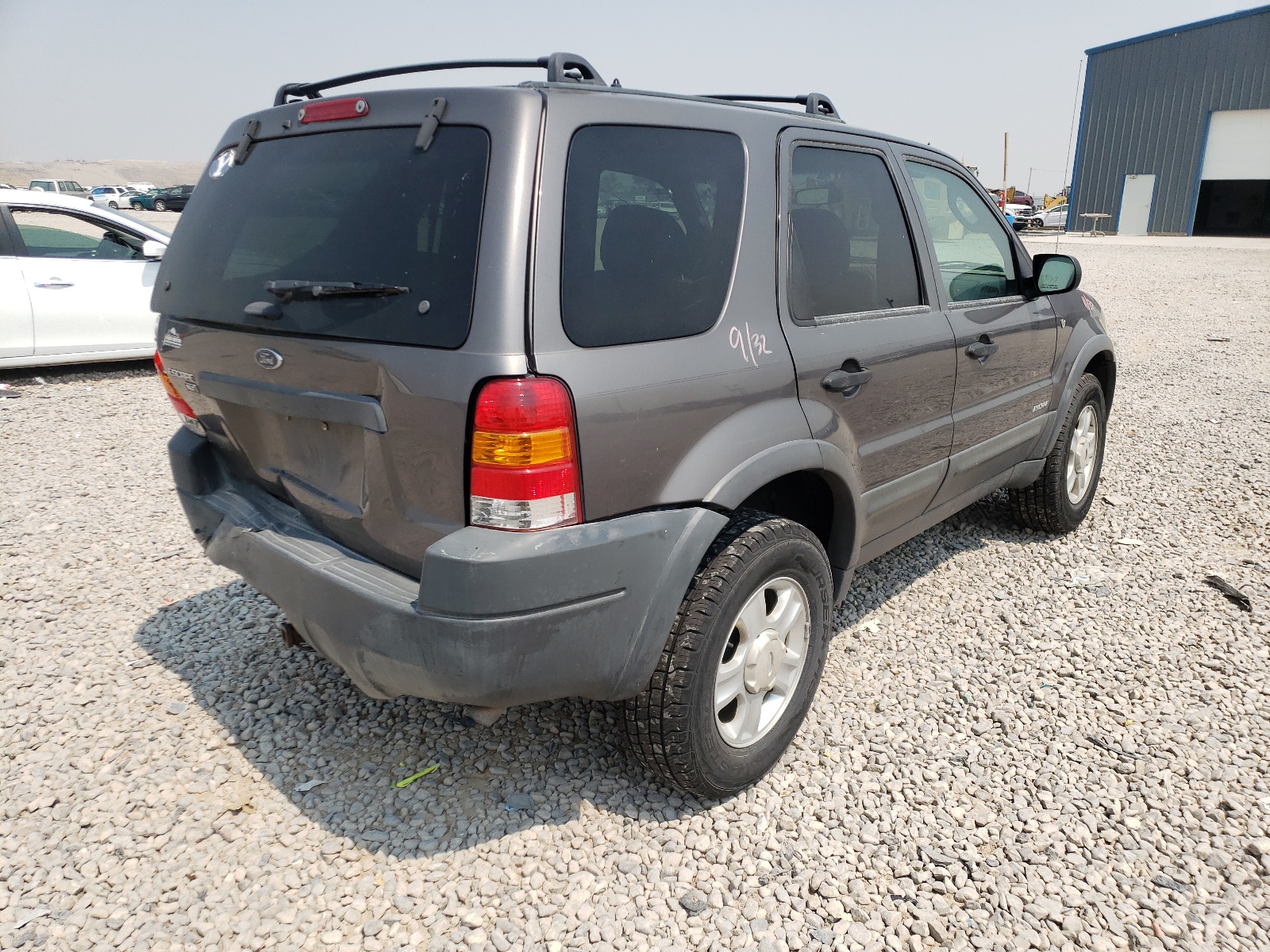 Photo 4 from auction – 2002 FORD ESCAPE XLT with VIN 1FMYU04152KE02710