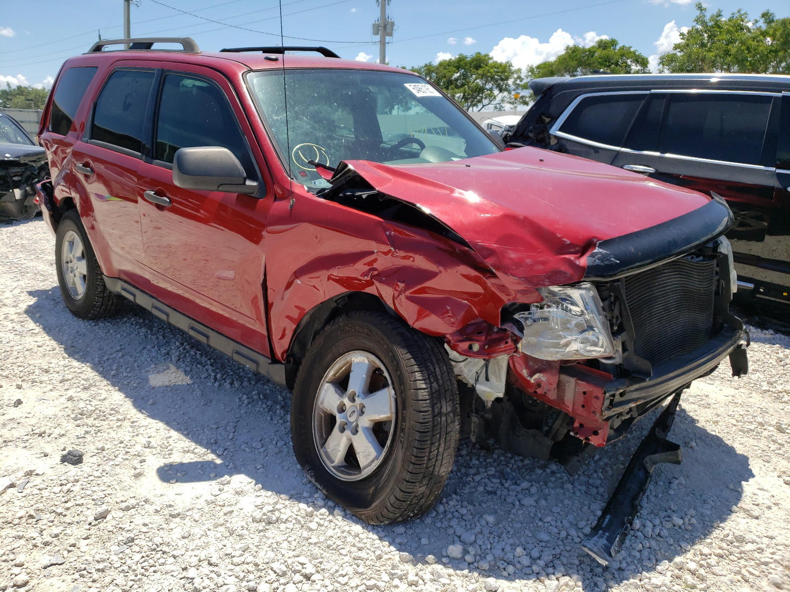 FORD ESCAPE XLT 2011 with VIN 1FMCU0D74BKB63763 - Photo from auction