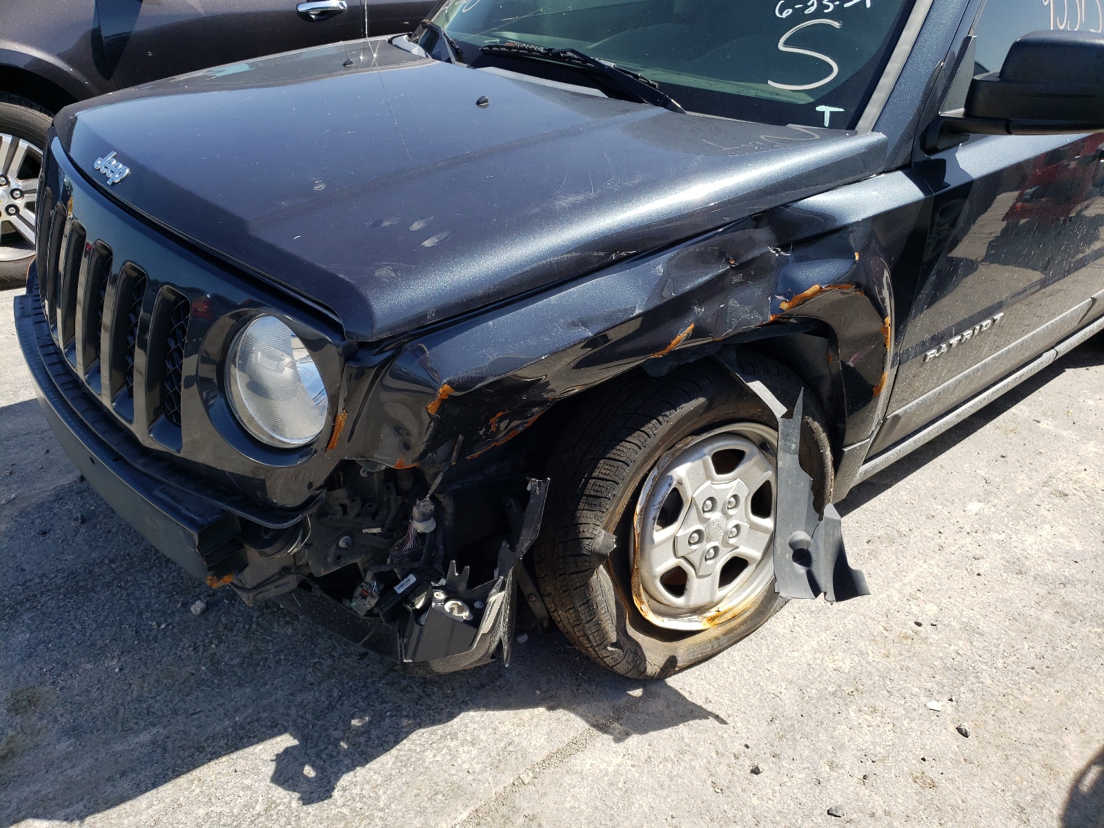 Photo 9 from auction – 2015 JEEP PATRIOT SP with VIN 1C4NJPBB0FD296214
