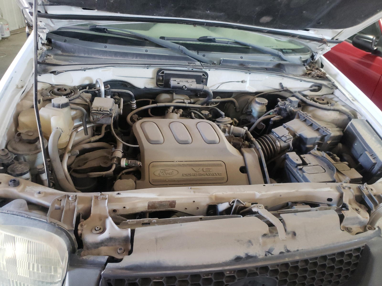 Photo 7 from auction – 2003 FORD ESCAPE XLT with VIN 1FMCU93133KA80246