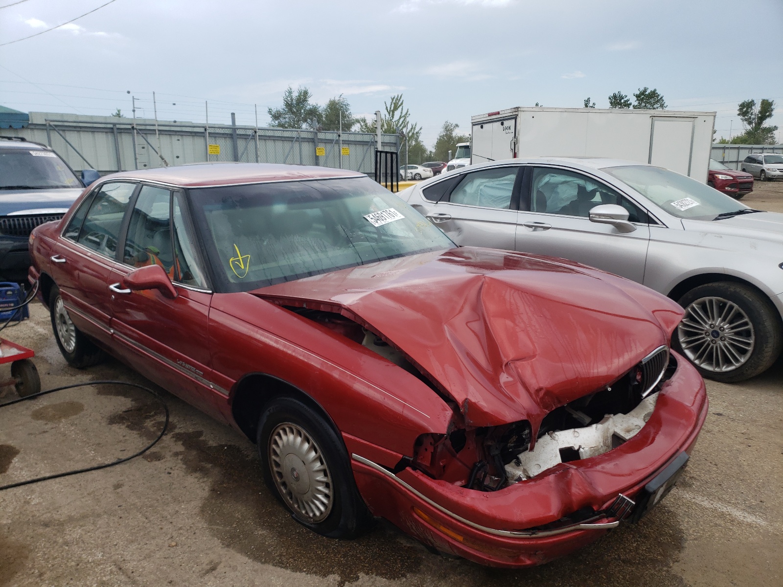BUICK LESABRE LI 1997 with VIN 1G4HR52K7VH599262 - Photo from auction