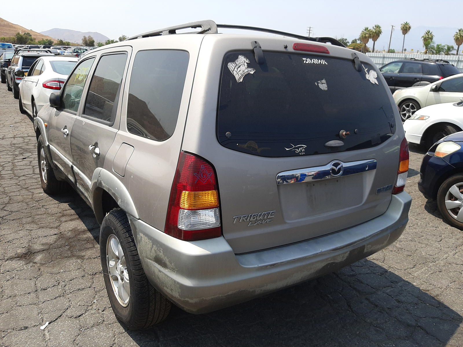 Photo 3 from auction – 2001 MAZDA TRIBUTE LX with VIN 4F2CU081X1KM50341