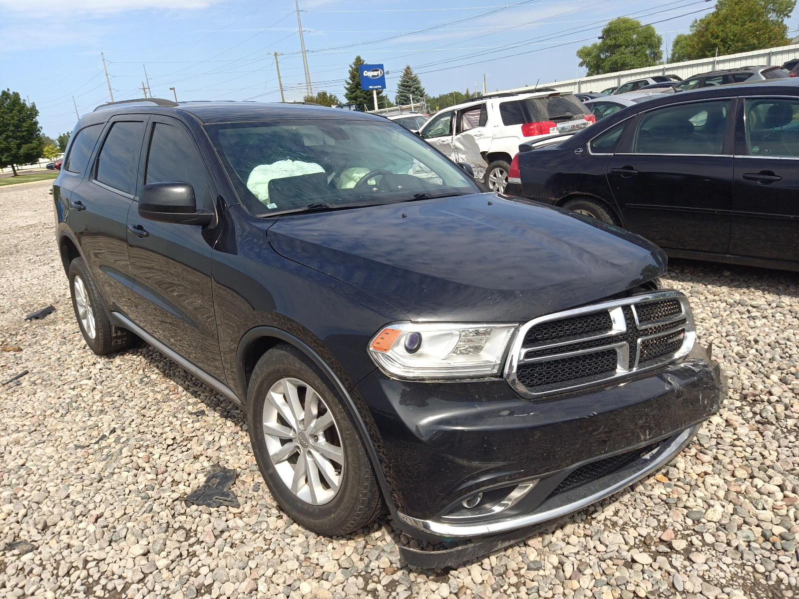 DODGE DURANGO SX 2014 with VIN 1C4RDJAG1EC397320 - Photo from auction