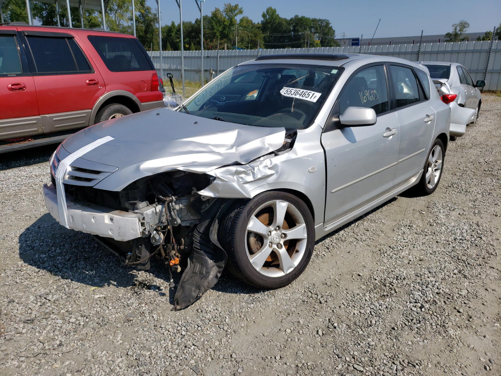 Photo 2 from auction – 2004 MAZDA 3 HATCHBAC with VIN JM1BK343741128373