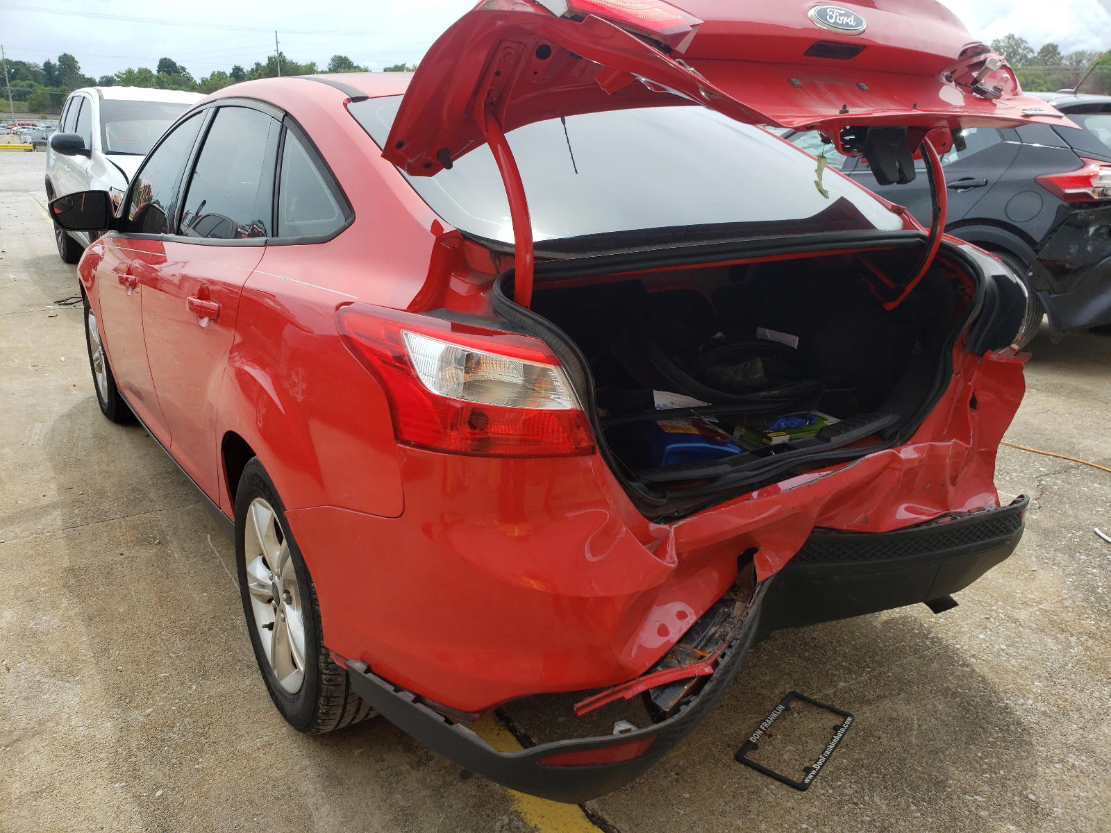 Photo 3 from auction – 2013 FORD FOCUS SE with VIN 1FADP3F24DL380381