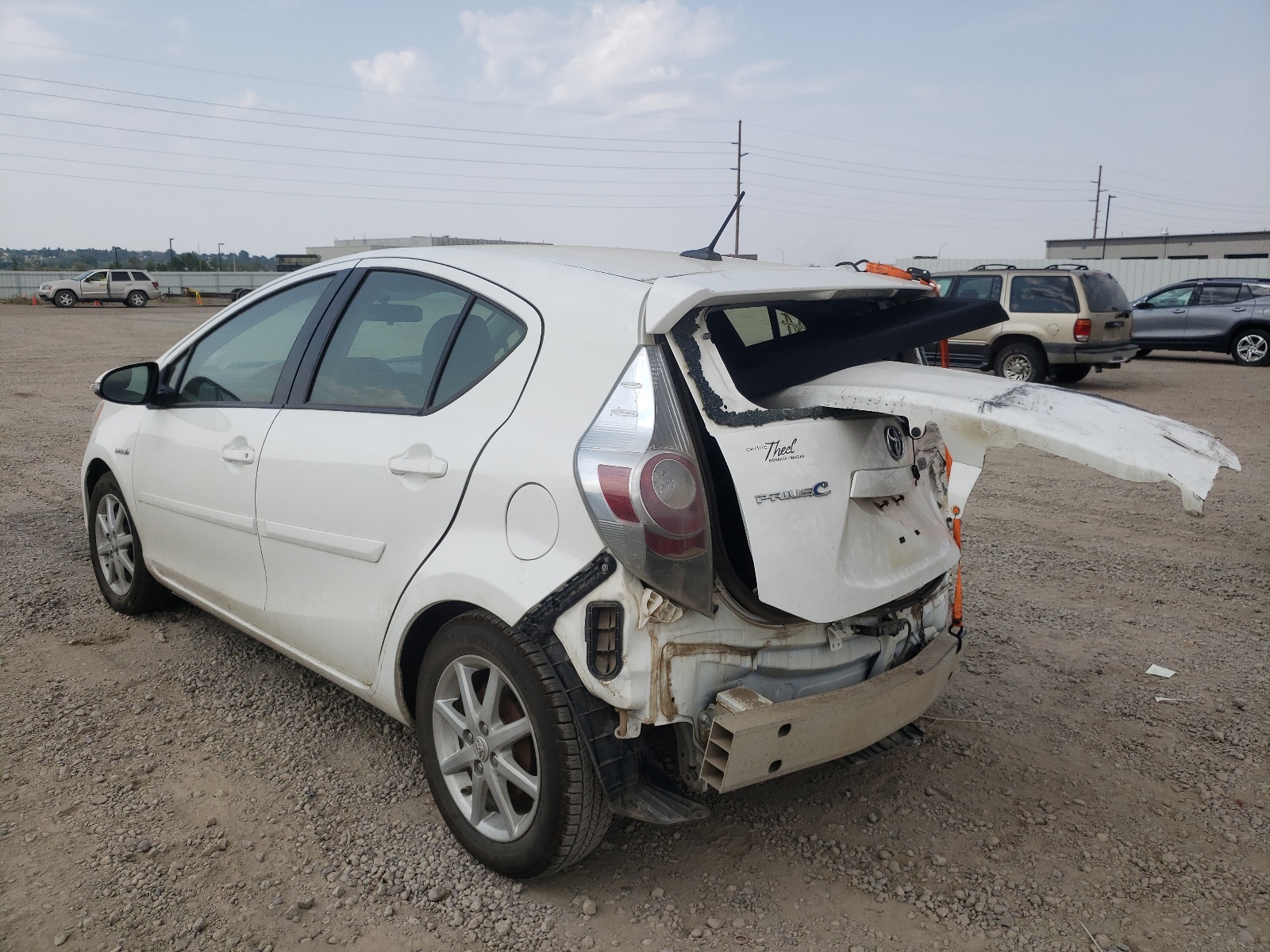 Photo 3 from auction – 2013 TOYOTA PRIUS C with VIN JTDKDTB33D1033144