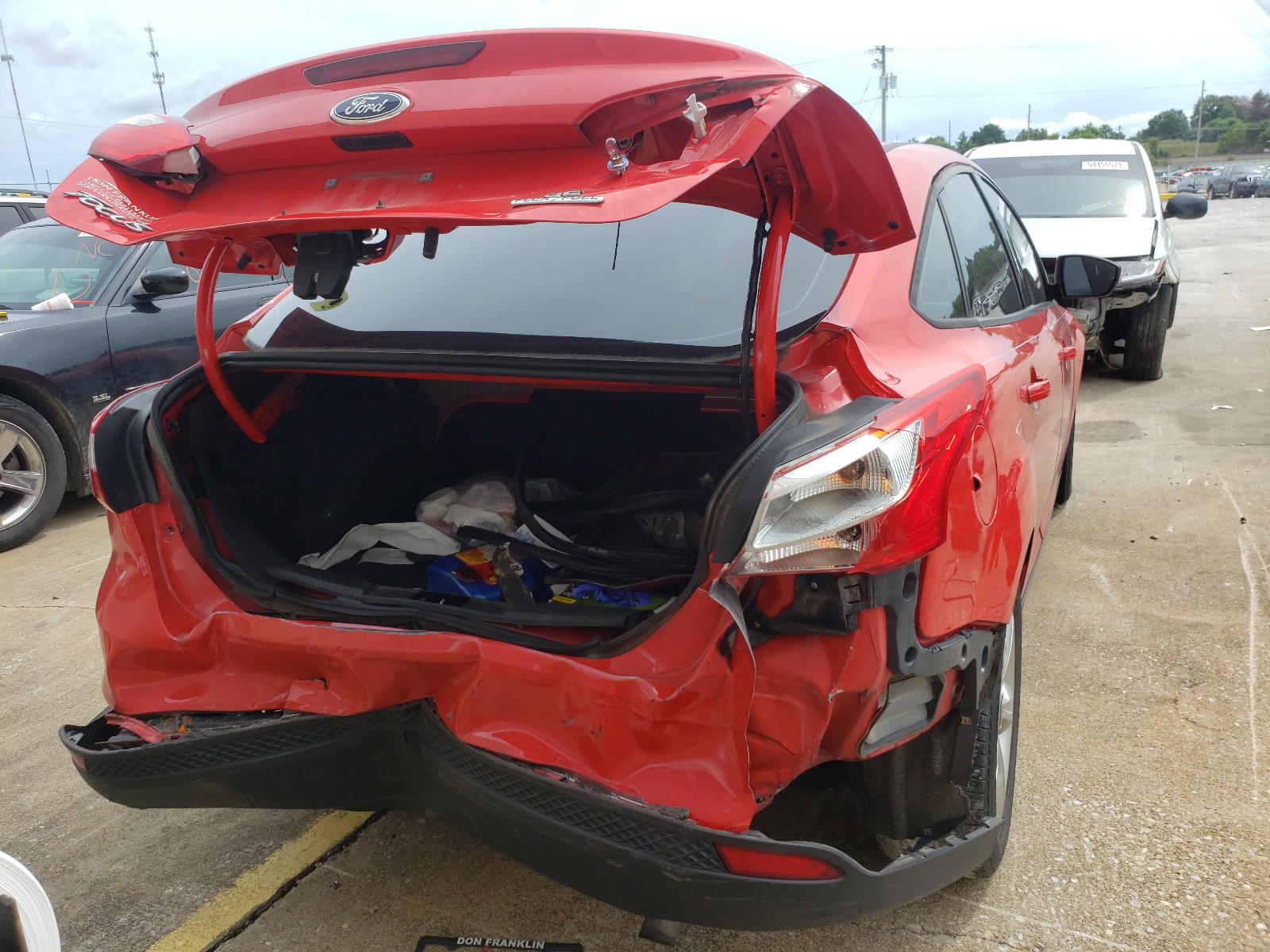 Photo 4 from auction – 2013 FORD FOCUS SE with VIN 1FADP3F24DL380381