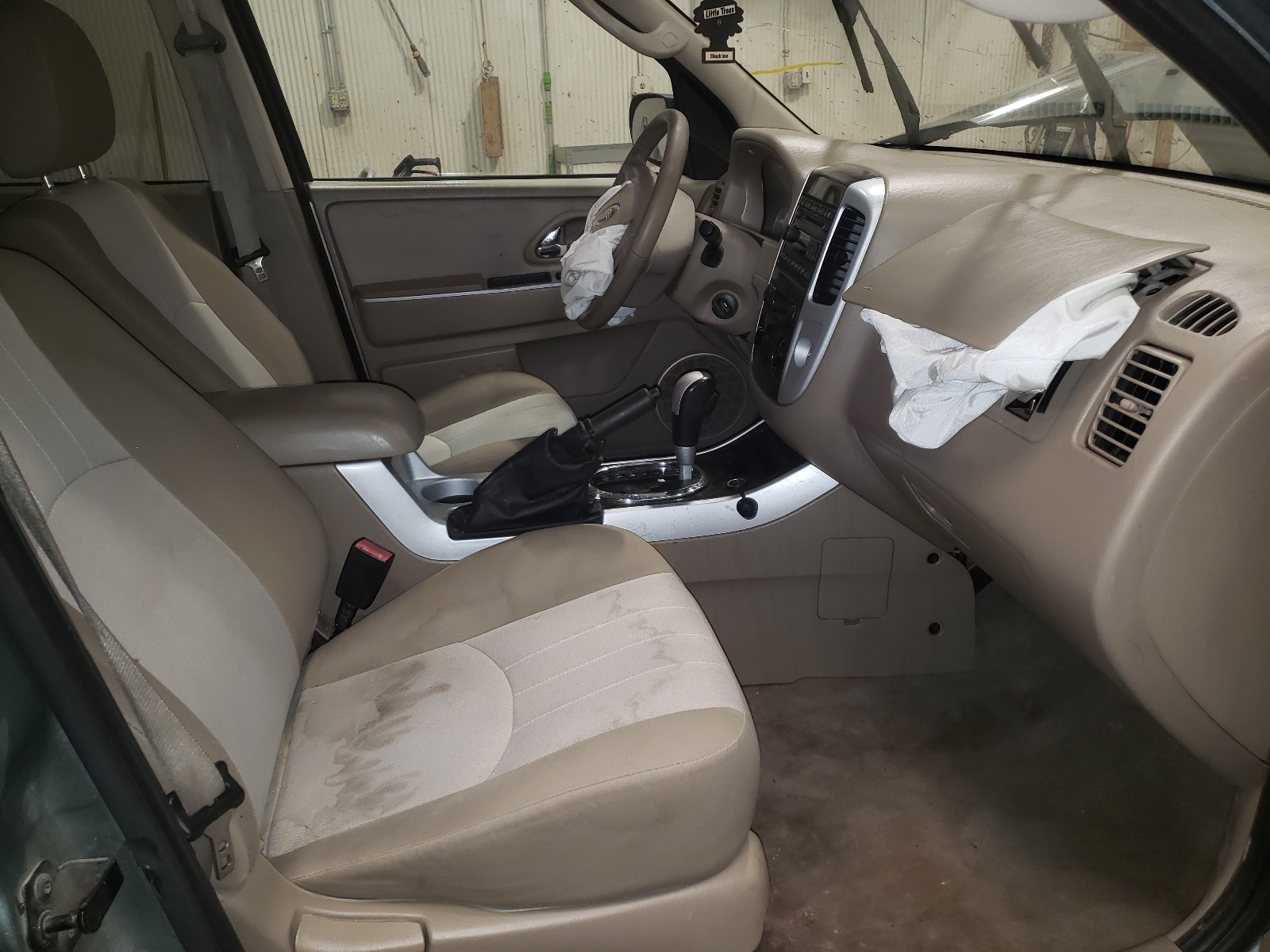 Photo 5 from auction – 2006 MERCURY MARINER with VIN 4M2YU57136DJ01564