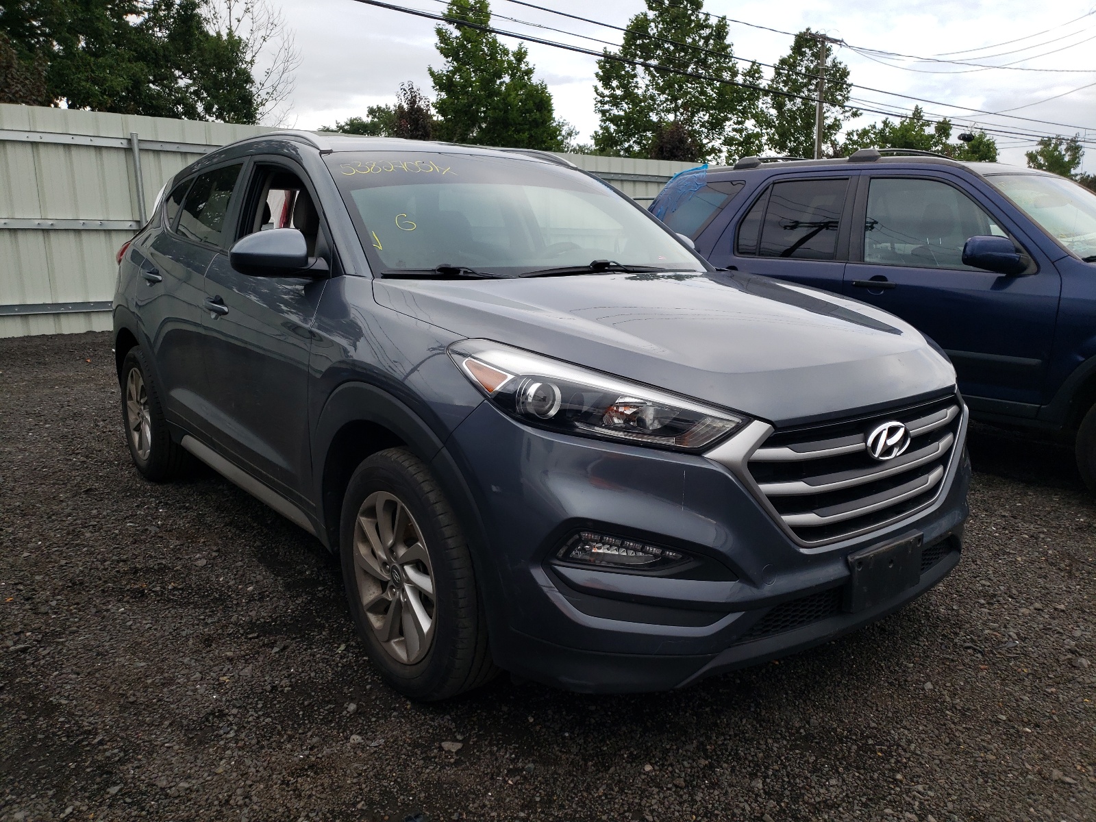 Photo 1 from auction – 2018 HYUNDAI TUCSON SEL with VIN KM8J3CA44JU718820