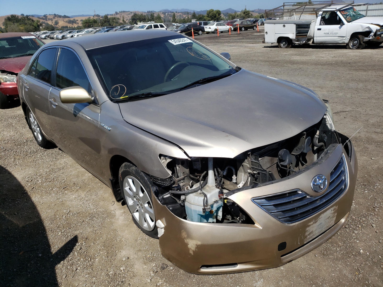 TOYOTA CAMRY HYBR 2007 with VIN JTNBB46K173030261 - Photo from auction