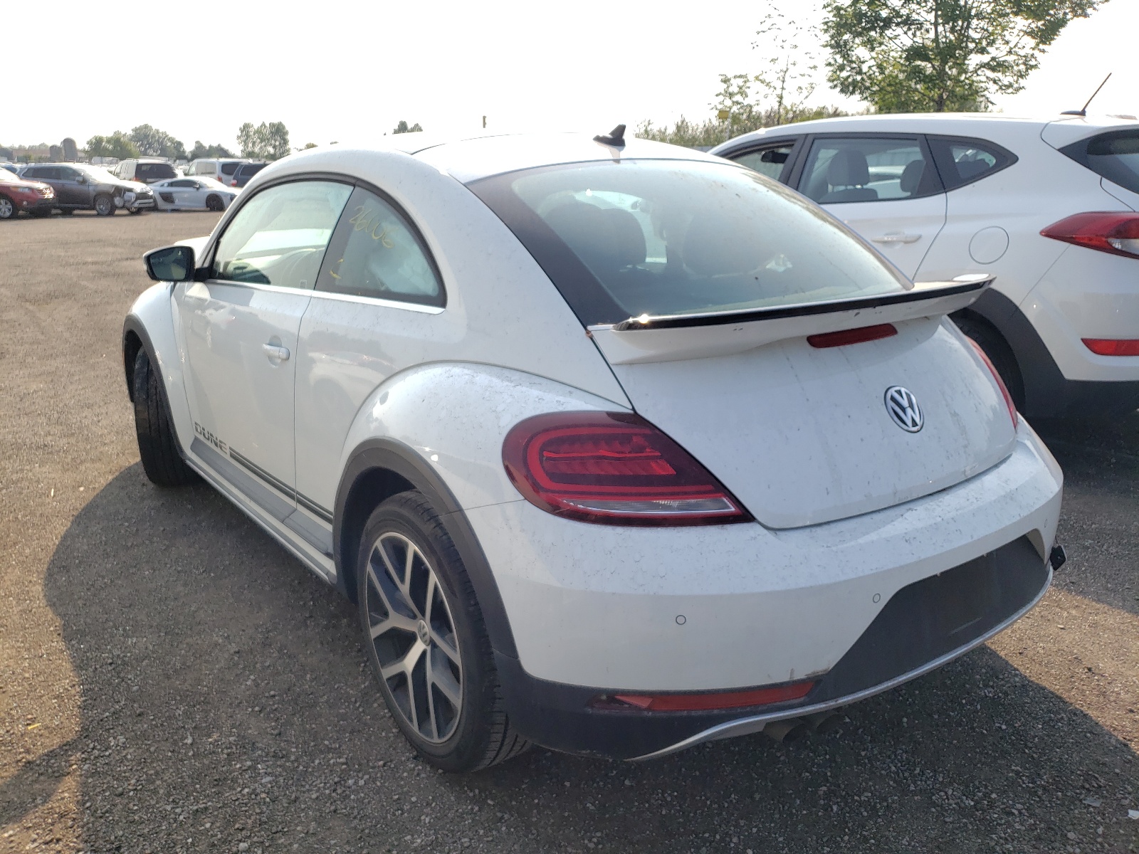 Photo 3 from auction – 2019 VOLKSWAGEN BEETLE DUN with VIN 3VWSD7AT4KM708361