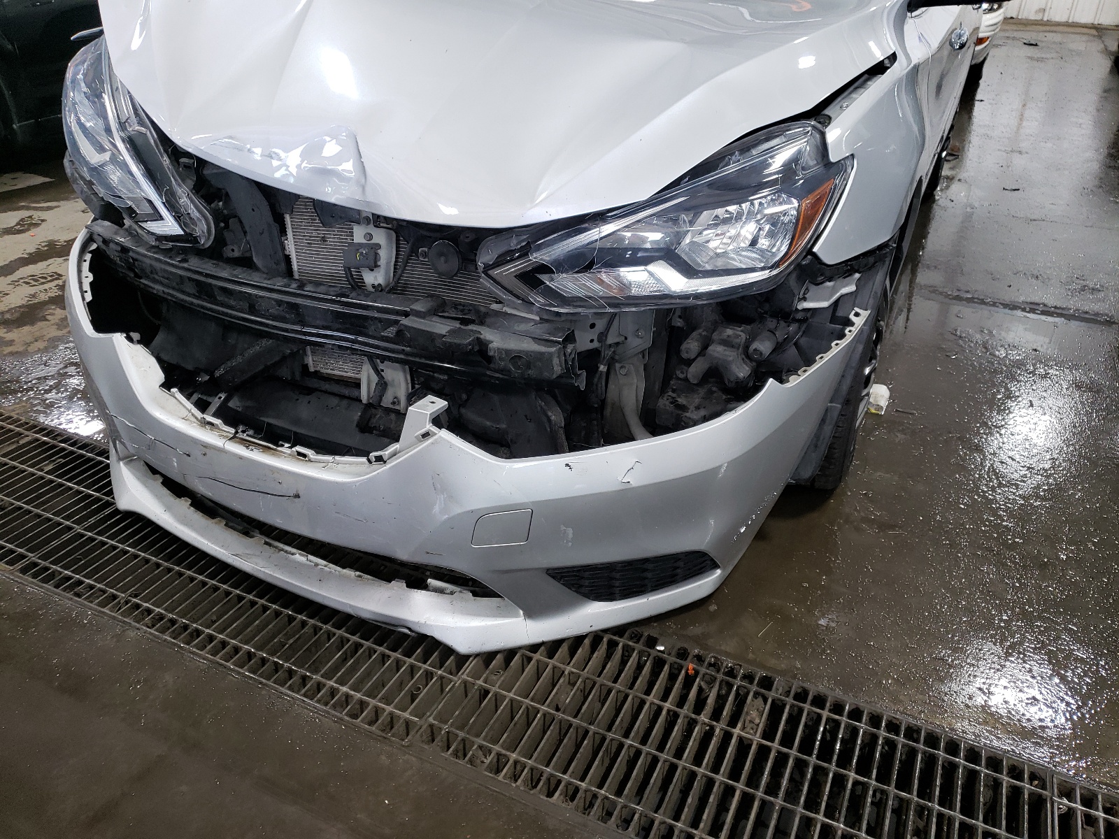 Photo 9 from auction – 2018 NISSAN SENTRA S with VIN 3N1AB7AP3JY287007