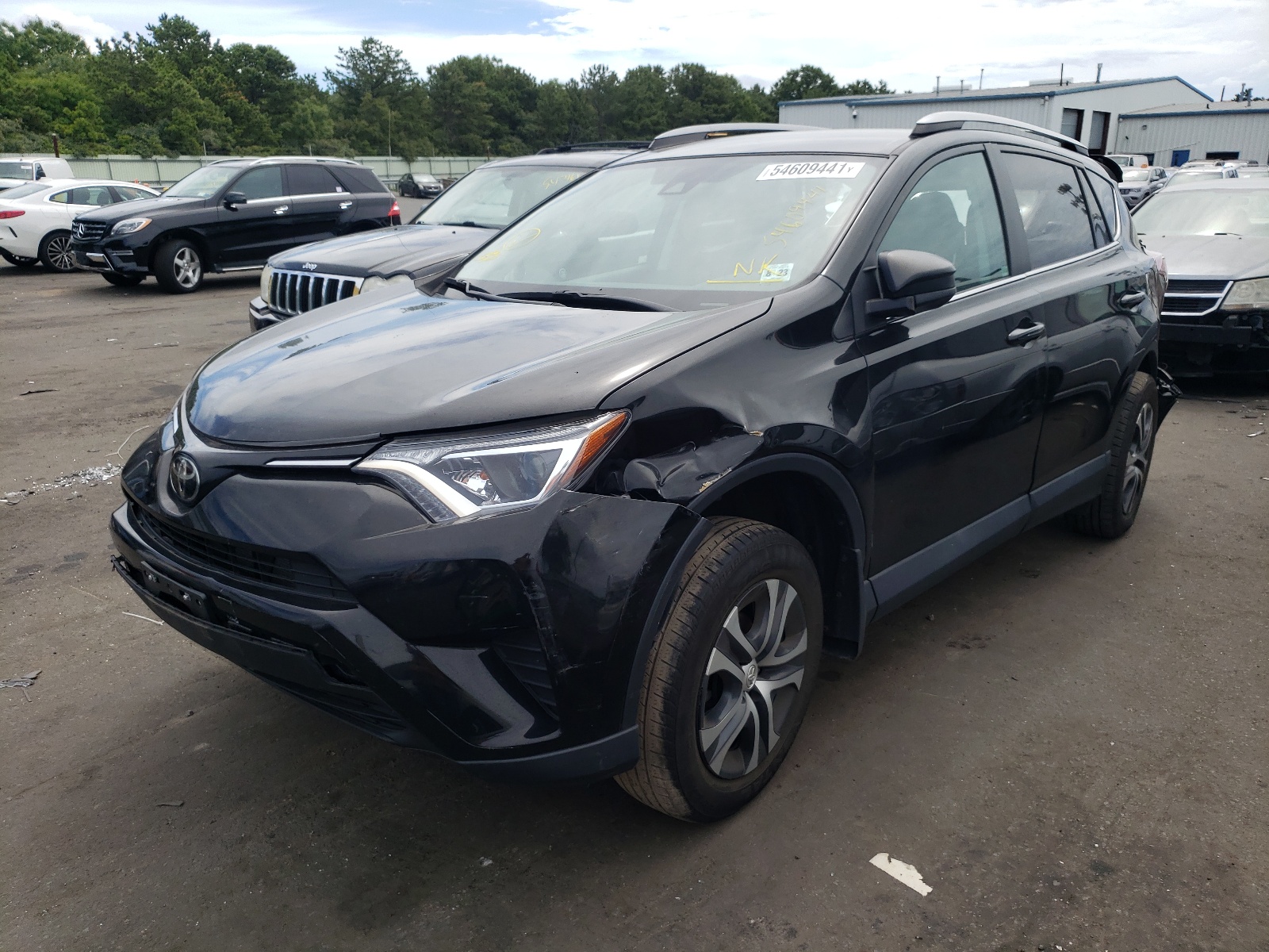 Photo 2 from auction – 2018 TOYOTA RAV4 LE with VIN 2T3BFREV8JW805774