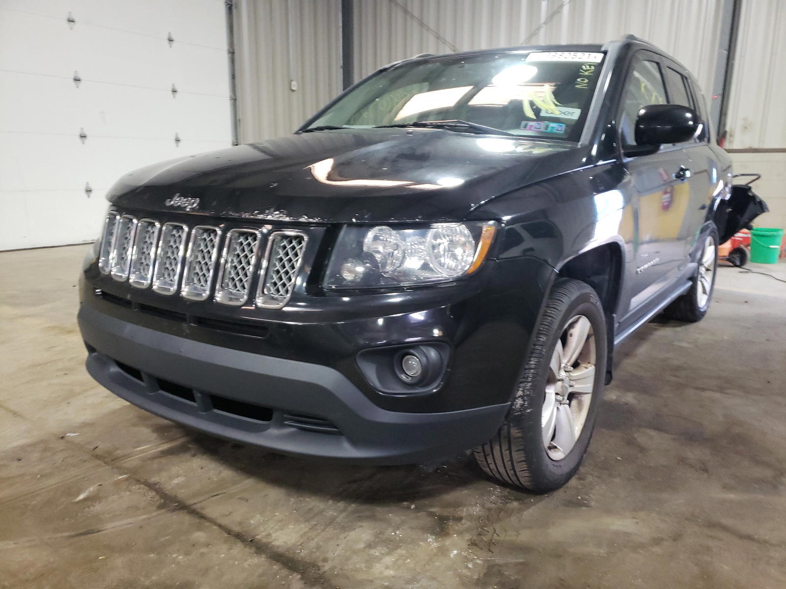 Photo 2 from auction – 2014 JEEP COMPASS LA with VIN 1C4NJDEB0ED600280