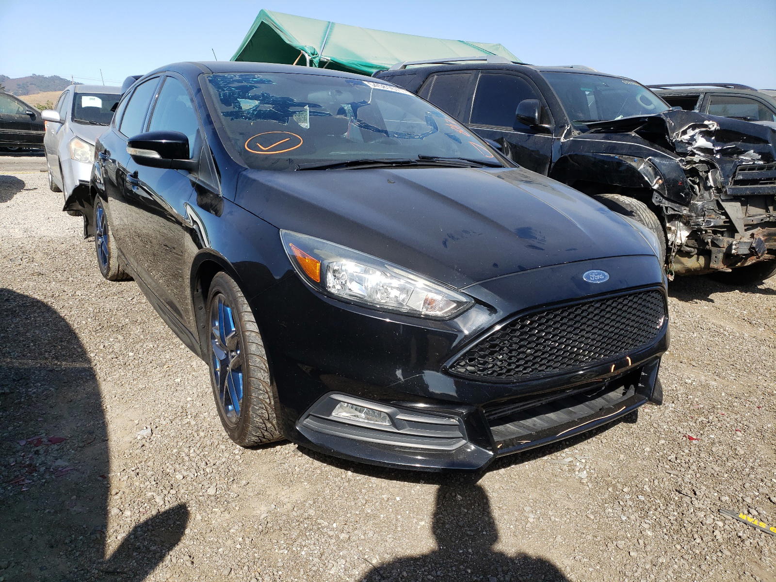 FORD FOCUS ST 2016 with VIN 1FADP3L92GL282682 - Photo from auction