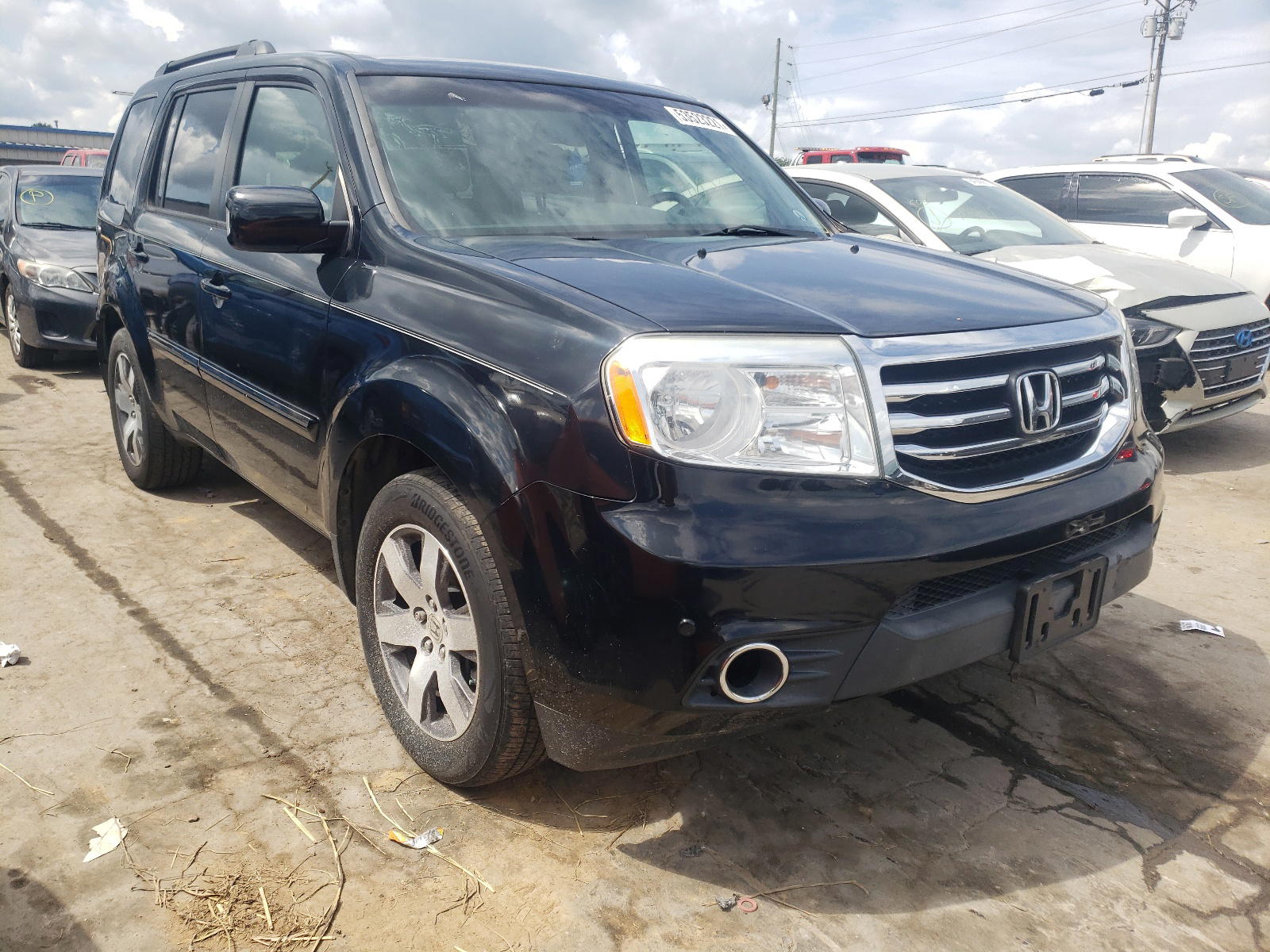 HONDA PILOT TOUR 2012 with VIN 5FNYF4H91CB073119 - Photo from auction