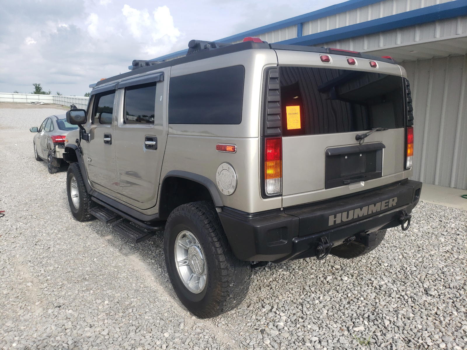 Photo 3 from auction – 2003 HUMMER H2 with VIN 5GRGN23U23H101426