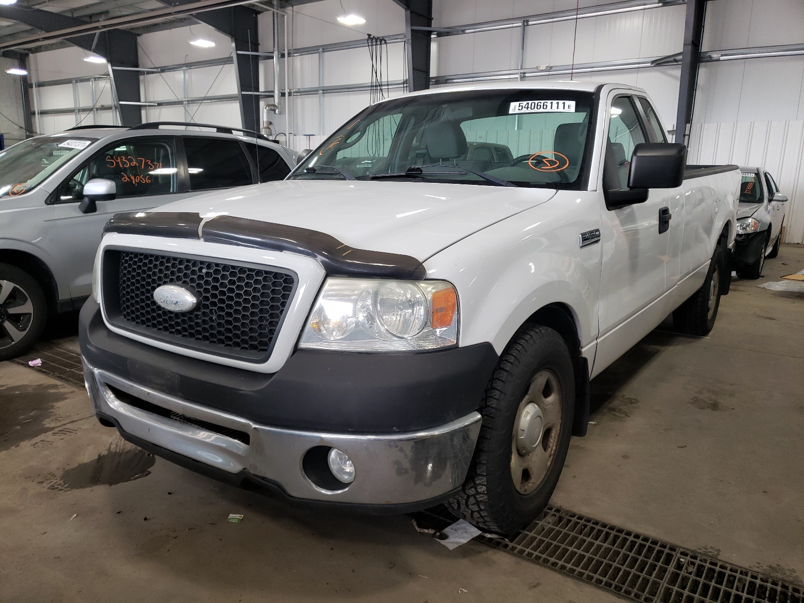 Photo 2 from auction – 2006 FORD F150 with VIN 1FTRF12266NB74838