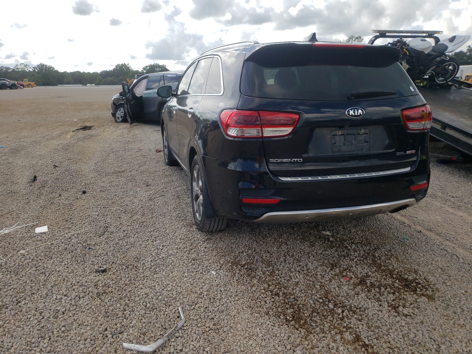 Photo 3 from auction – 2016 KIA SORENTO SX with VIN 5XYPK4A14GG030887
