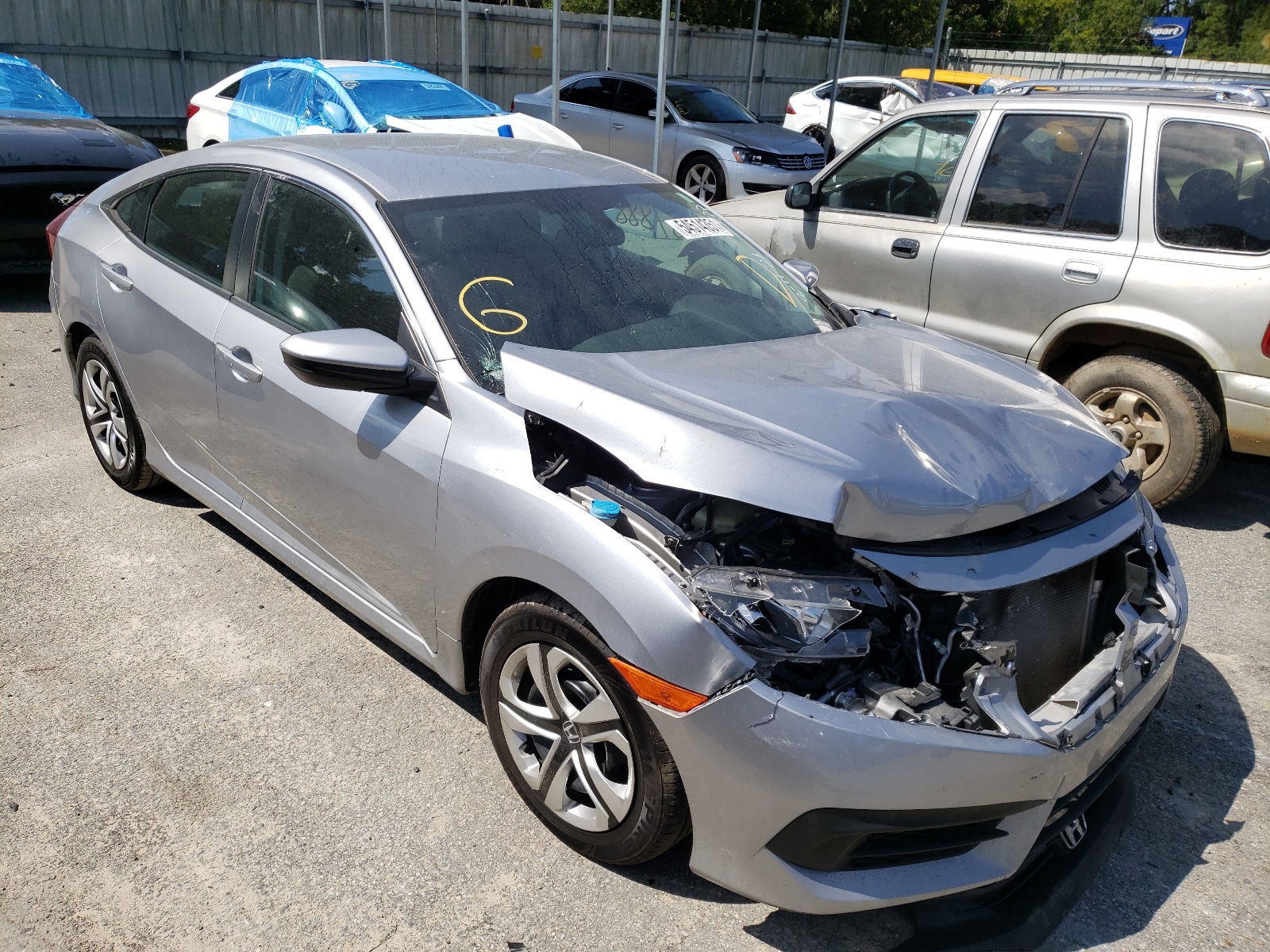 HONDA CIVIC LX 2017 with VIN 19XFC2F57HE047433 - Photo from auction