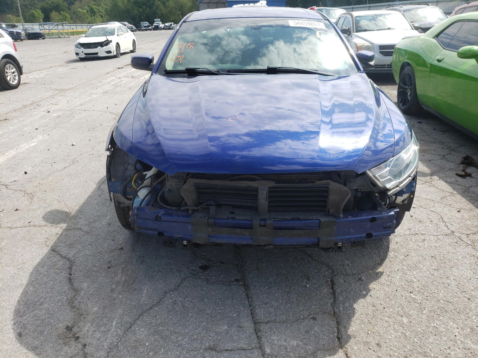 Photo 9 from auction – 2014 FORD TAURUS SEL with VIN 1FAHP2H82EG160034