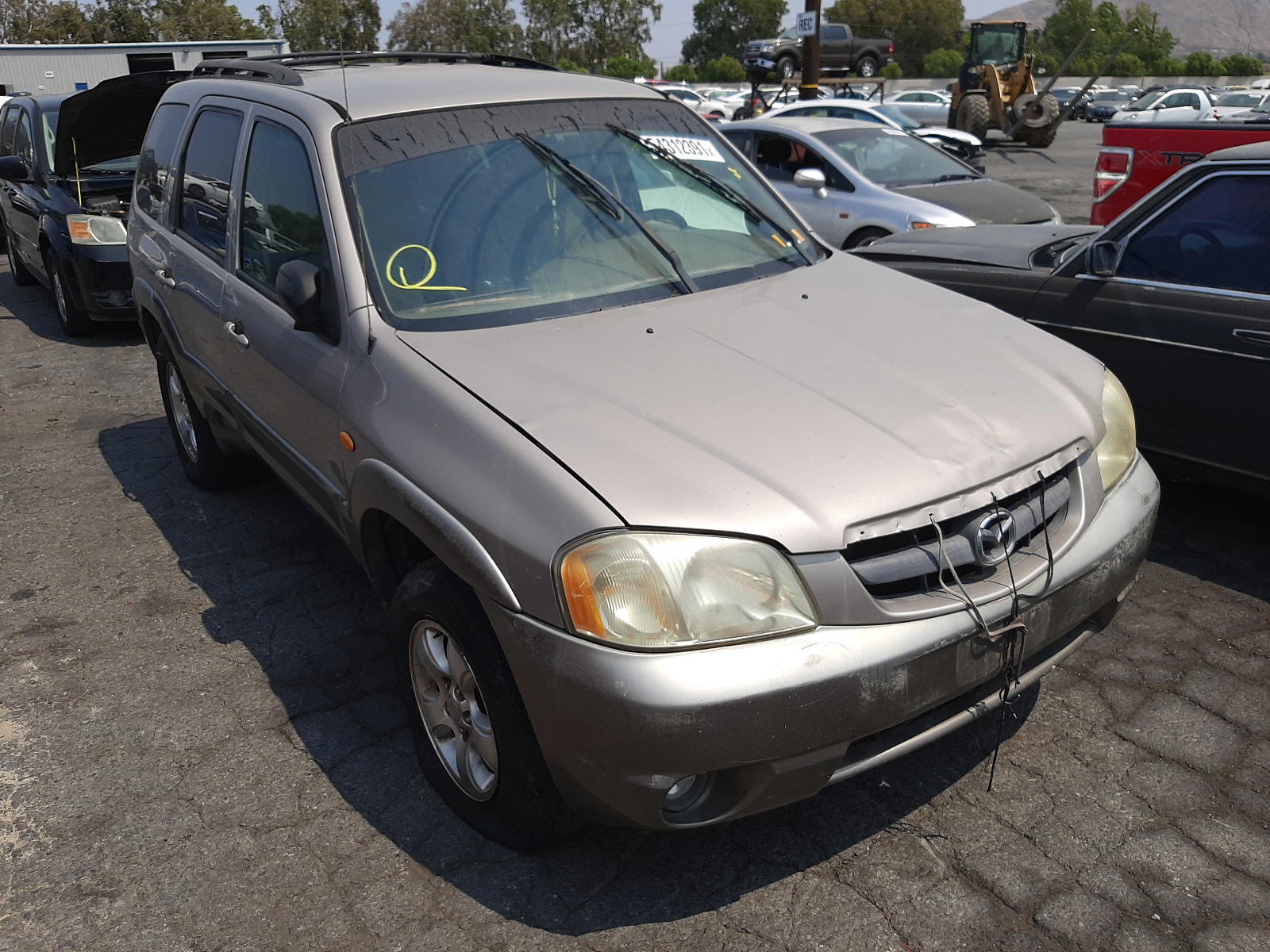 MAZDA TRIBUTE LX 2001 with VIN 4F2CU081X1KM50341 - Photo from auction