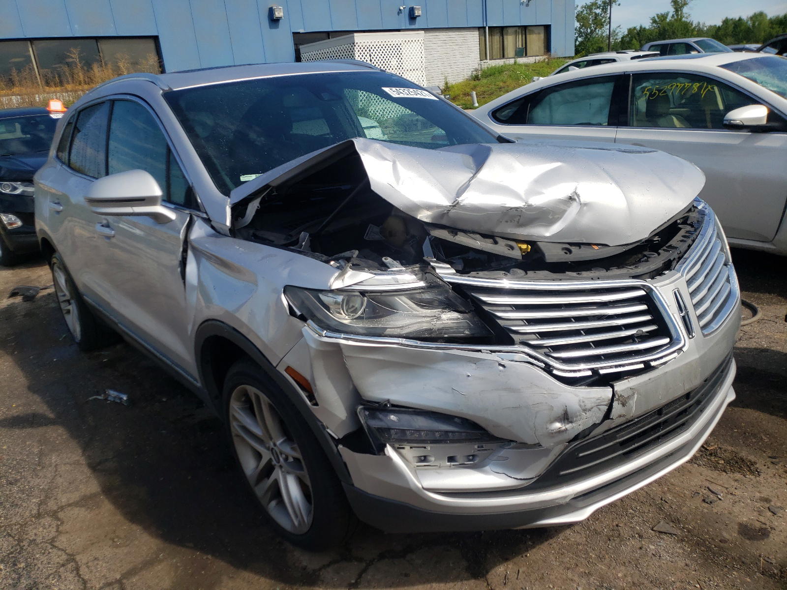 LINCOLN MKC 2015 with VIN 5LMTJ2AH4FUJ33204 - Photo from auction