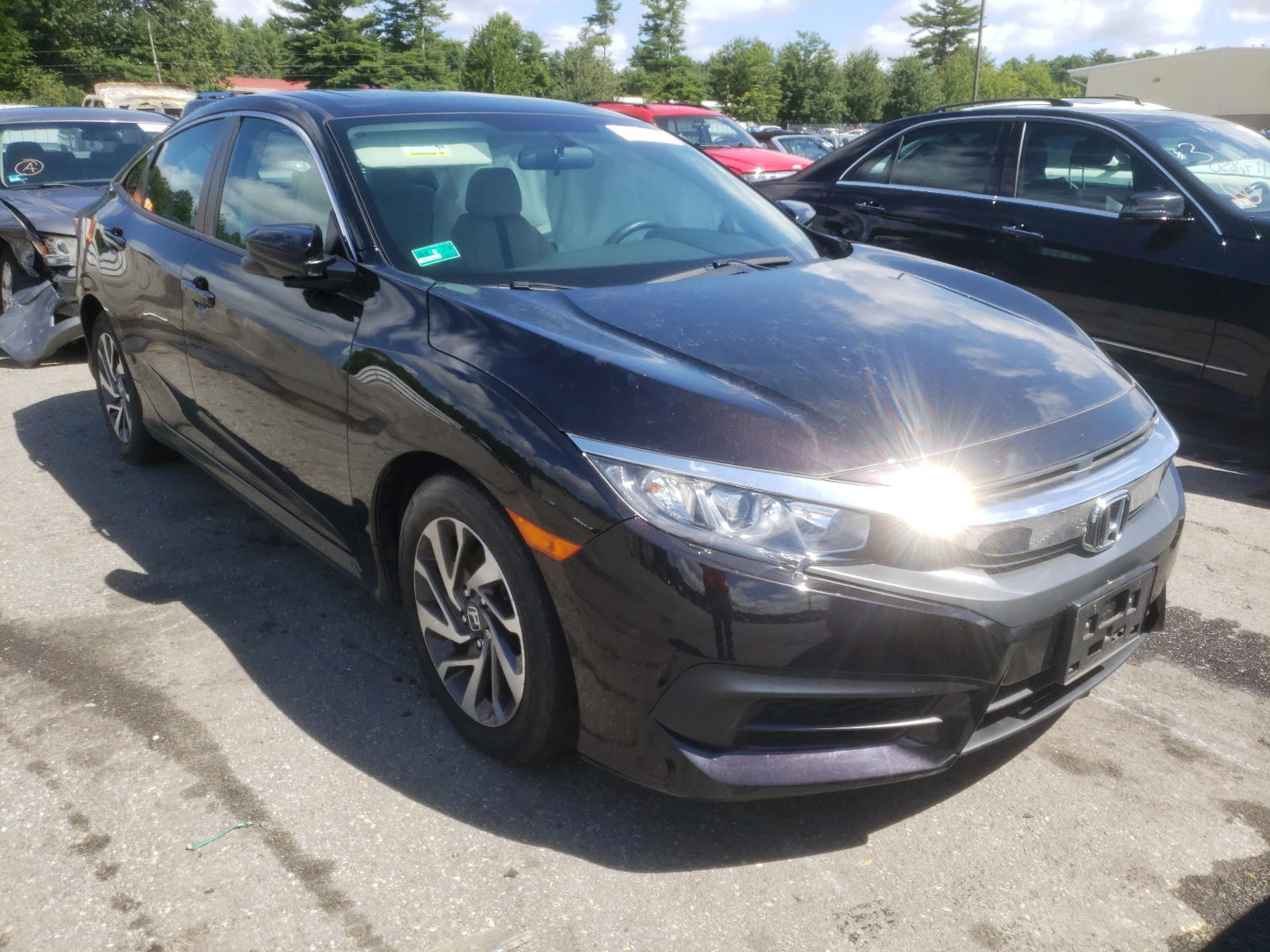 HONDA CIVIC EX 2017 with VIN 19XFC2F78HE207904 - Photo from auction