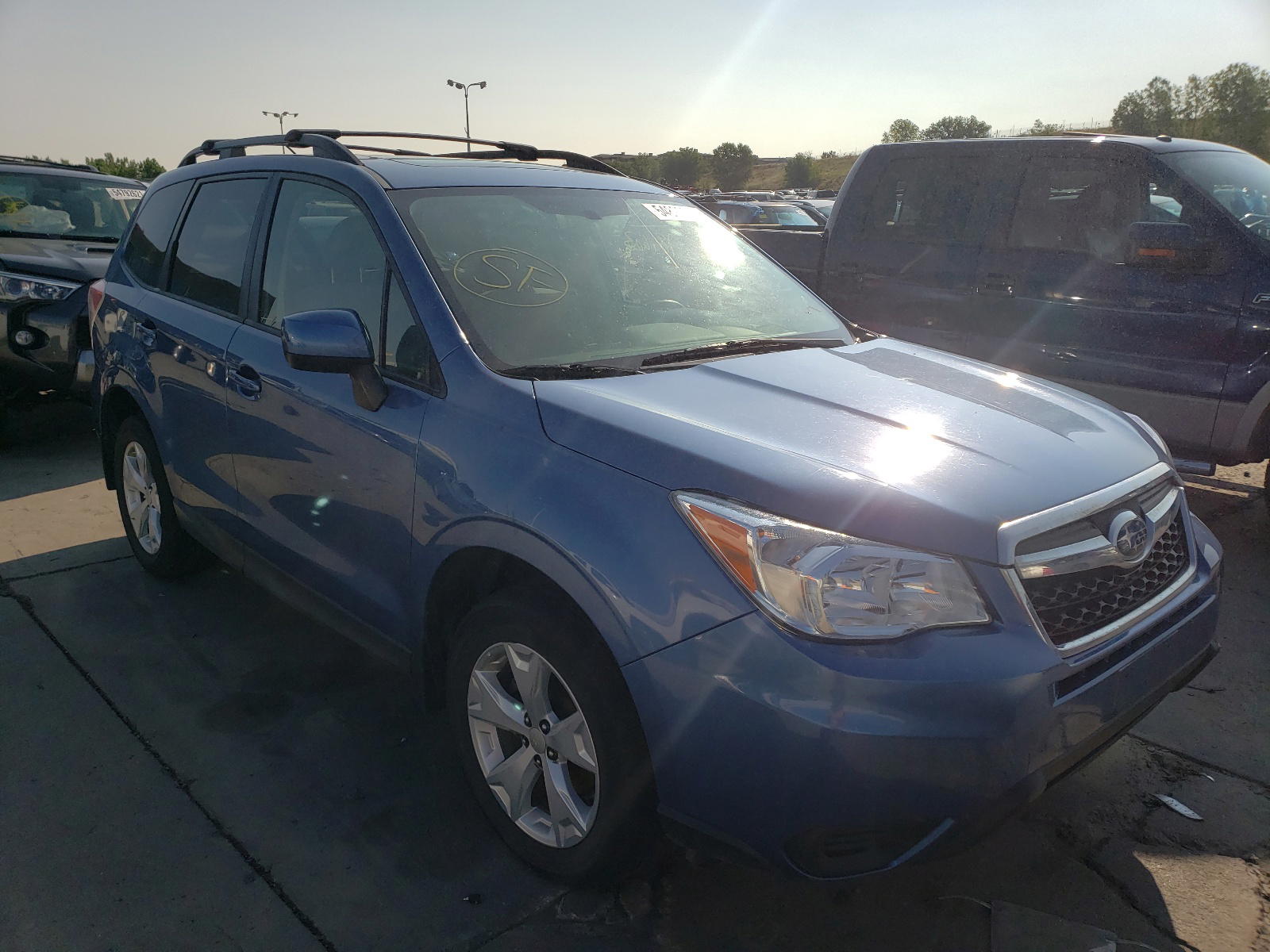 SUBARU FORESTER 2 2015 with VIN JF2SJADCXFH568994 - Photo from auction