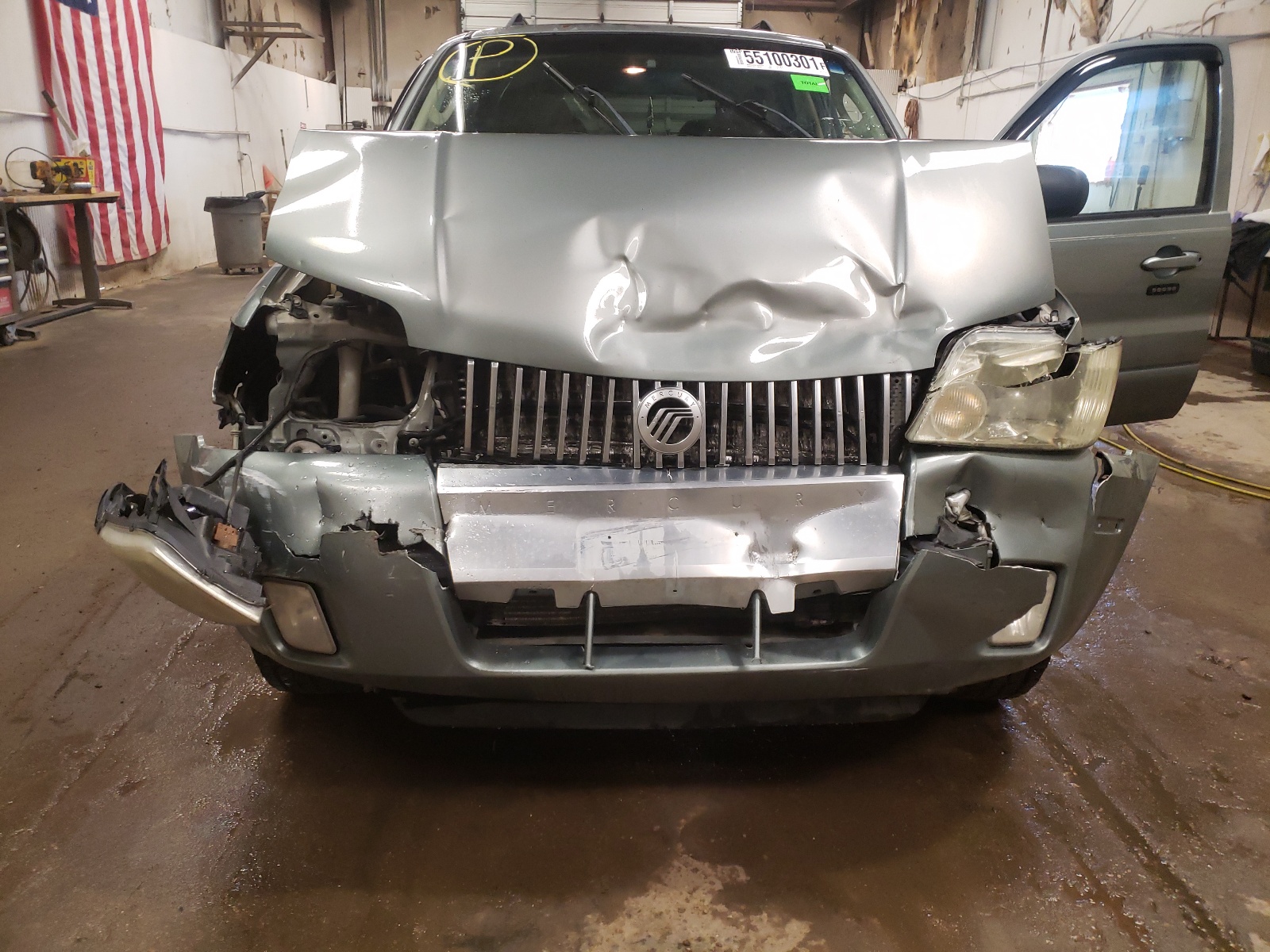 Photo 9 from auction – 2006 MERCURY MARINER with VIN 4M2YU57136DJ01564