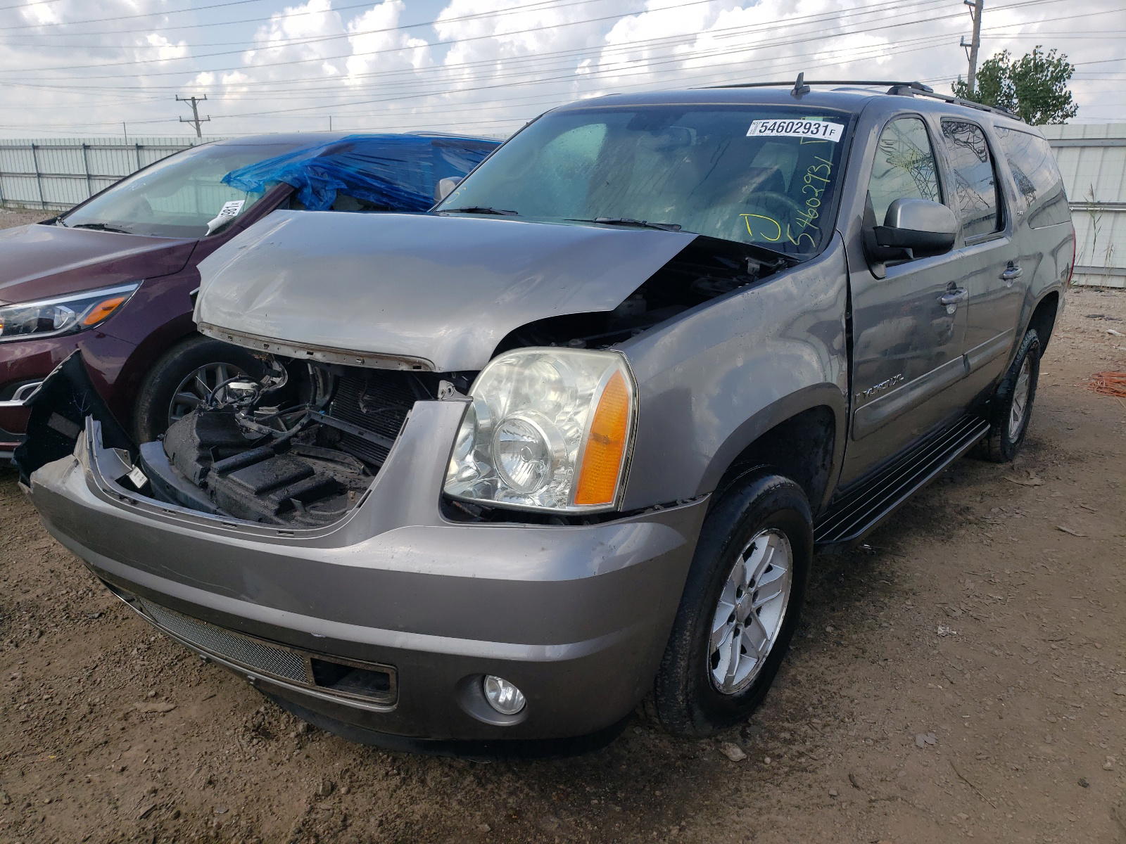 Photo 2 from auction – 2007 GMC YUKON with VIN 1GKFK16387J202072