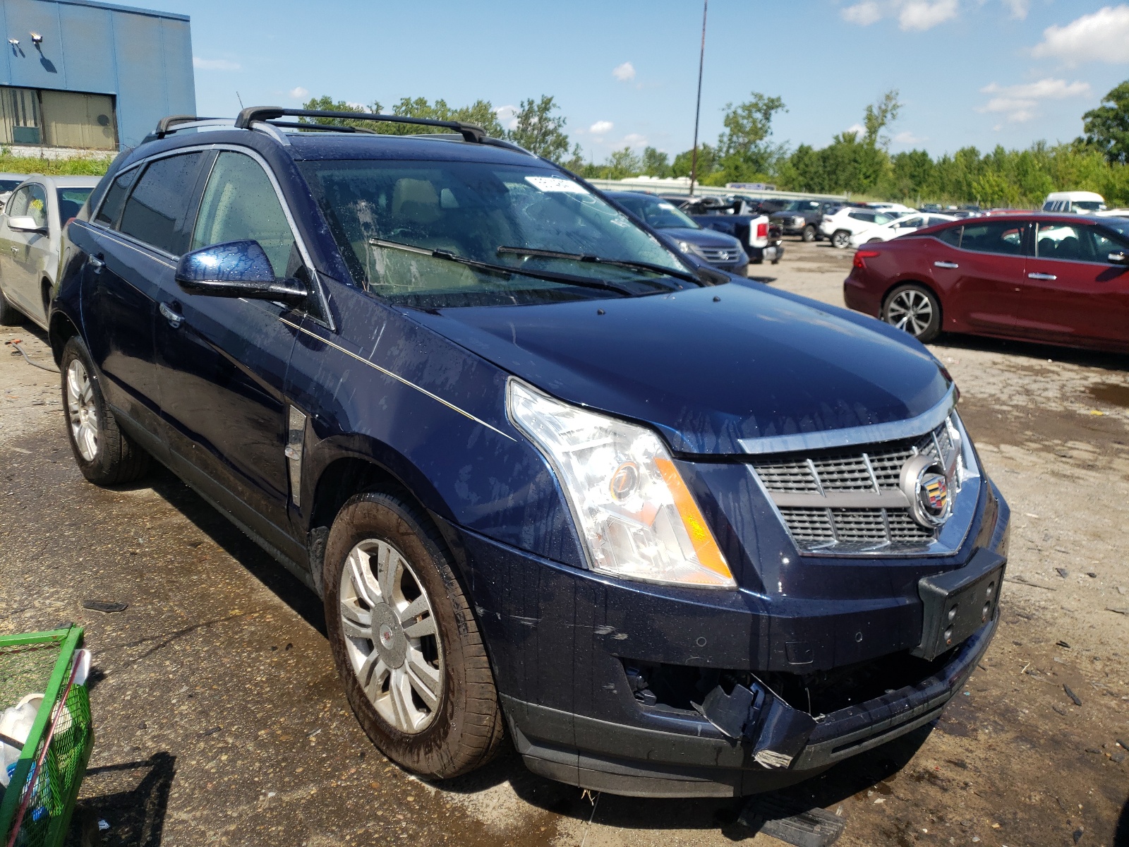 CADILLAC SRX LUXURY 2011 with VIN 3GYFNAEY3BS586490 - Photo from auction