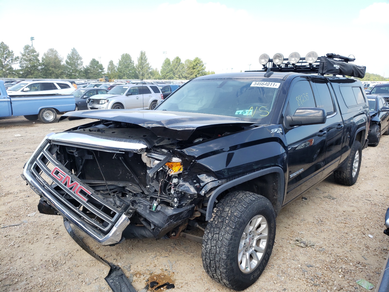 Photo 2 from auction – 2015 GMC SIERRA K15 with VIN 1GTV2UEC2FZ328860