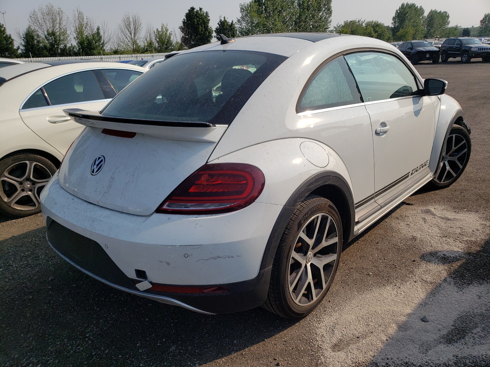 Photo 4 from auction – 2019 VOLKSWAGEN BEETLE DUN with VIN 3VWSD7AT4KM708361