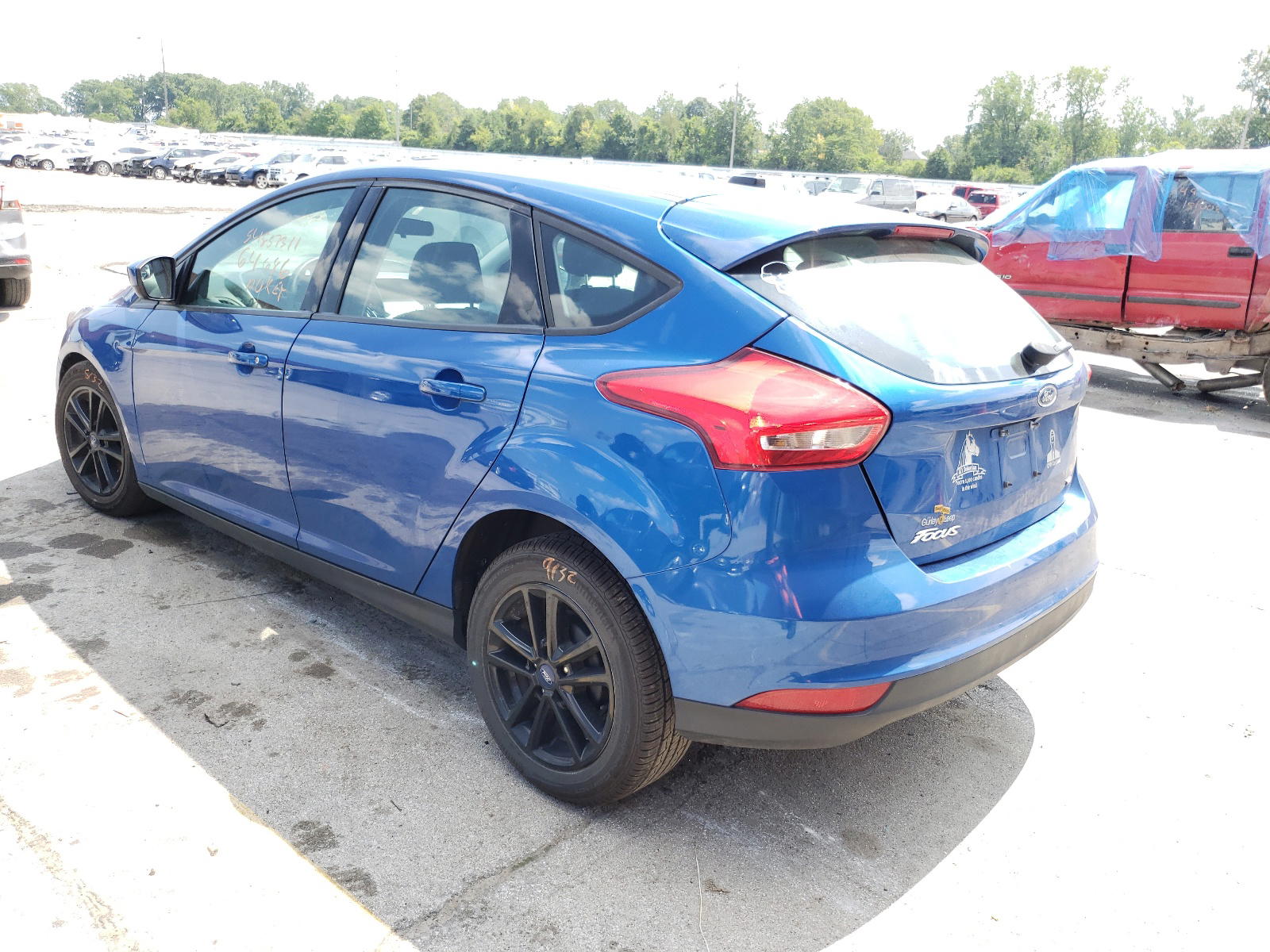 Photo 3 from auction – 2018 FORD FOCUS SE with VIN 1FADP3K29JL206047