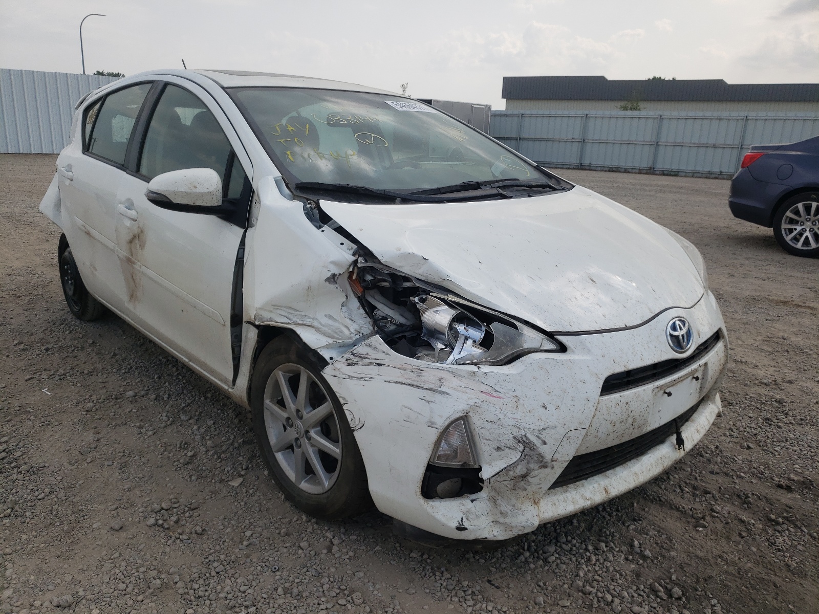 TOYOTA PRIUS C 2013 with VIN JTDKDTB33D1033144 - Photo from auction