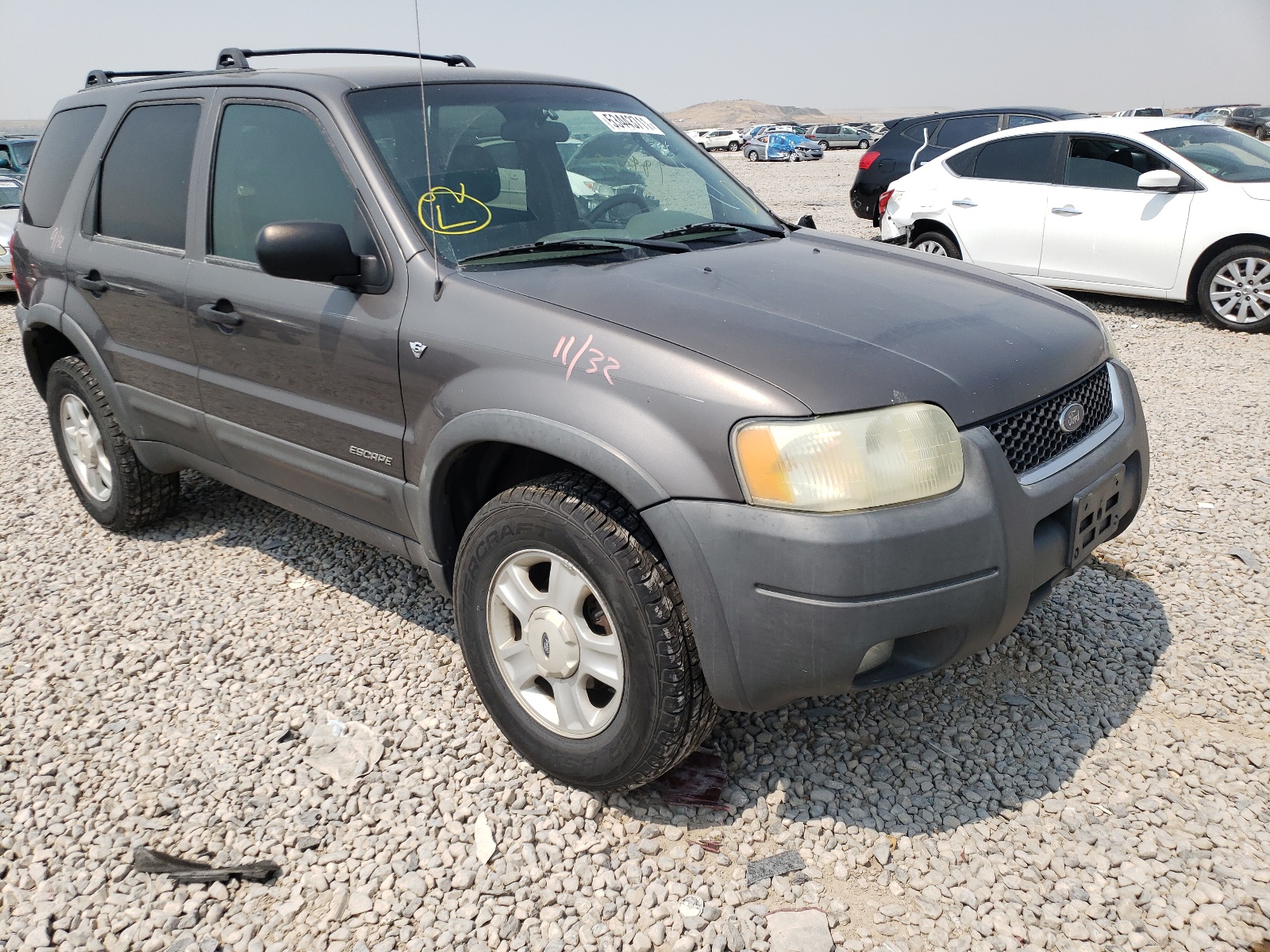 FORD ESCAPE XLT 2002 with VIN 1FMYU04152KE02710 - Photo from auction