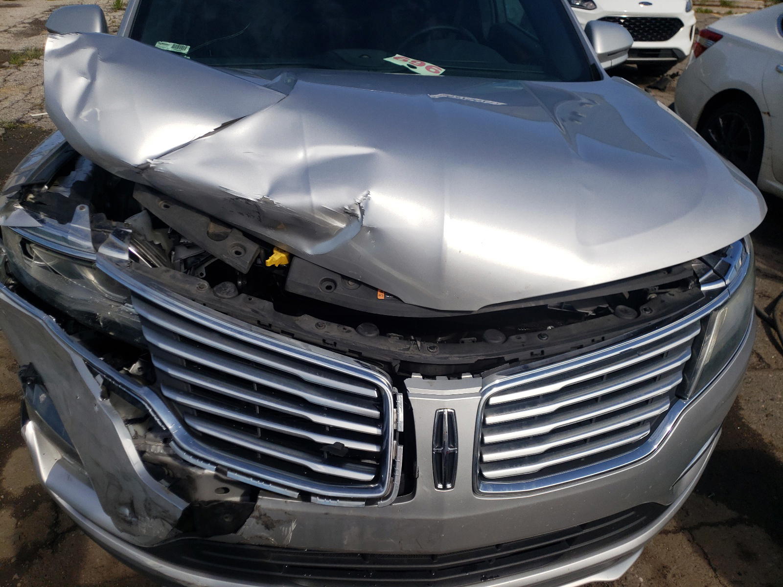 Photo 7 from auction – 2015 LINCOLN MKC with VIN 5LMTJ2AH4FUJ33204