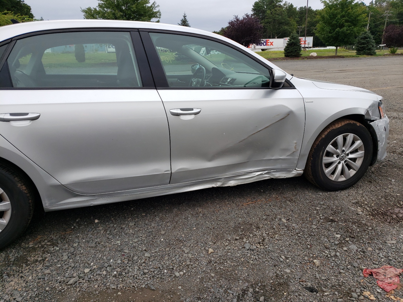 Photo 9 from auction – 2015 VOLKSWAGEN PASSAT S with VIN 1VWAT7A3XFC045626