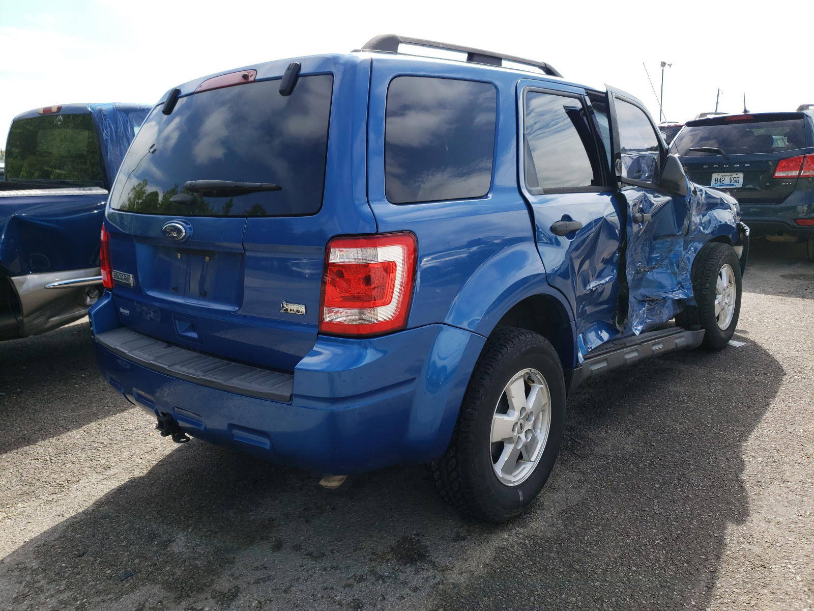 Photo 4 from auction – 2011 FORD ESCAPE XLT with VIN 1FMCU0DG9BKC70856