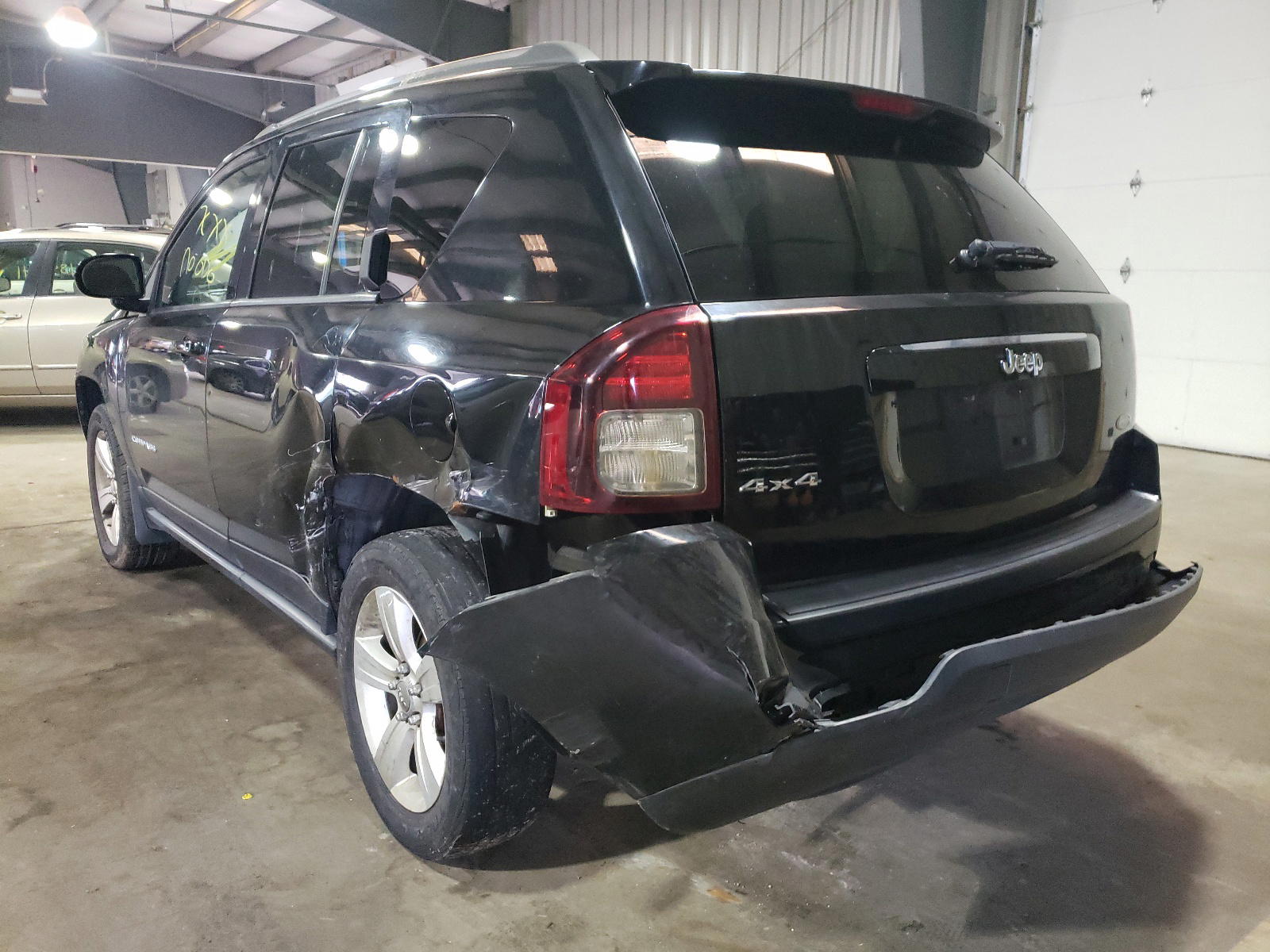 Photo 3 from auction – 2014 JEEP COMPASS LA with VIN 1C4NJDEB0ED600280