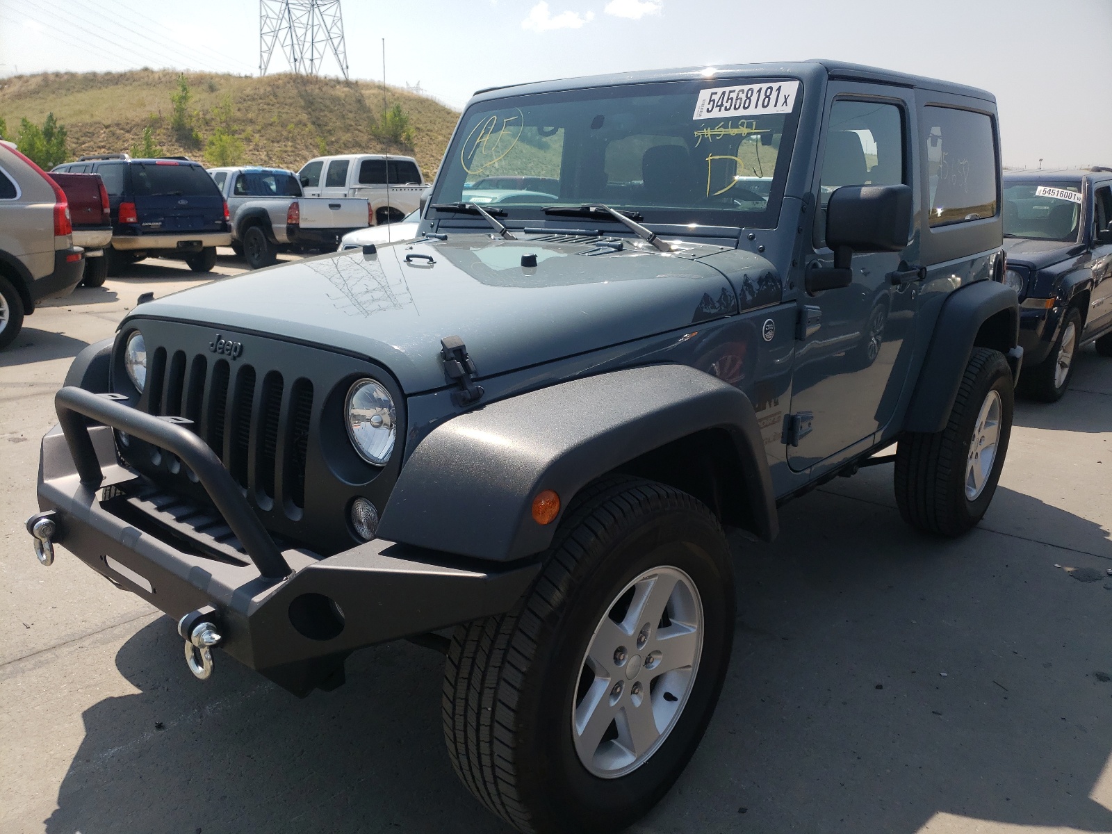 Photo 2 from auction – 2015 JEEP WRANGLER S with VIN 1C4AJWAG9FL773458